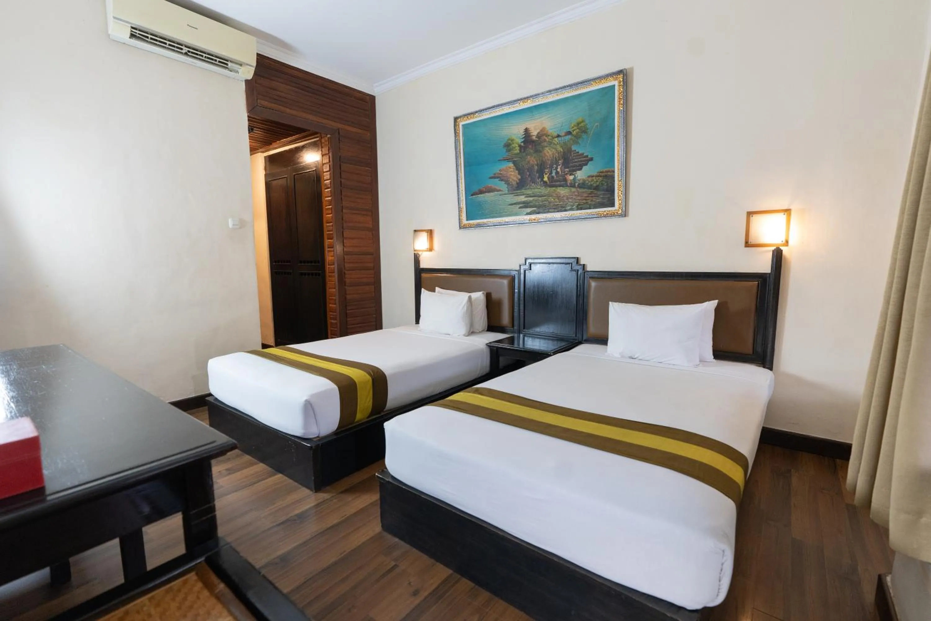 Bed in The Flora Kuta Bali