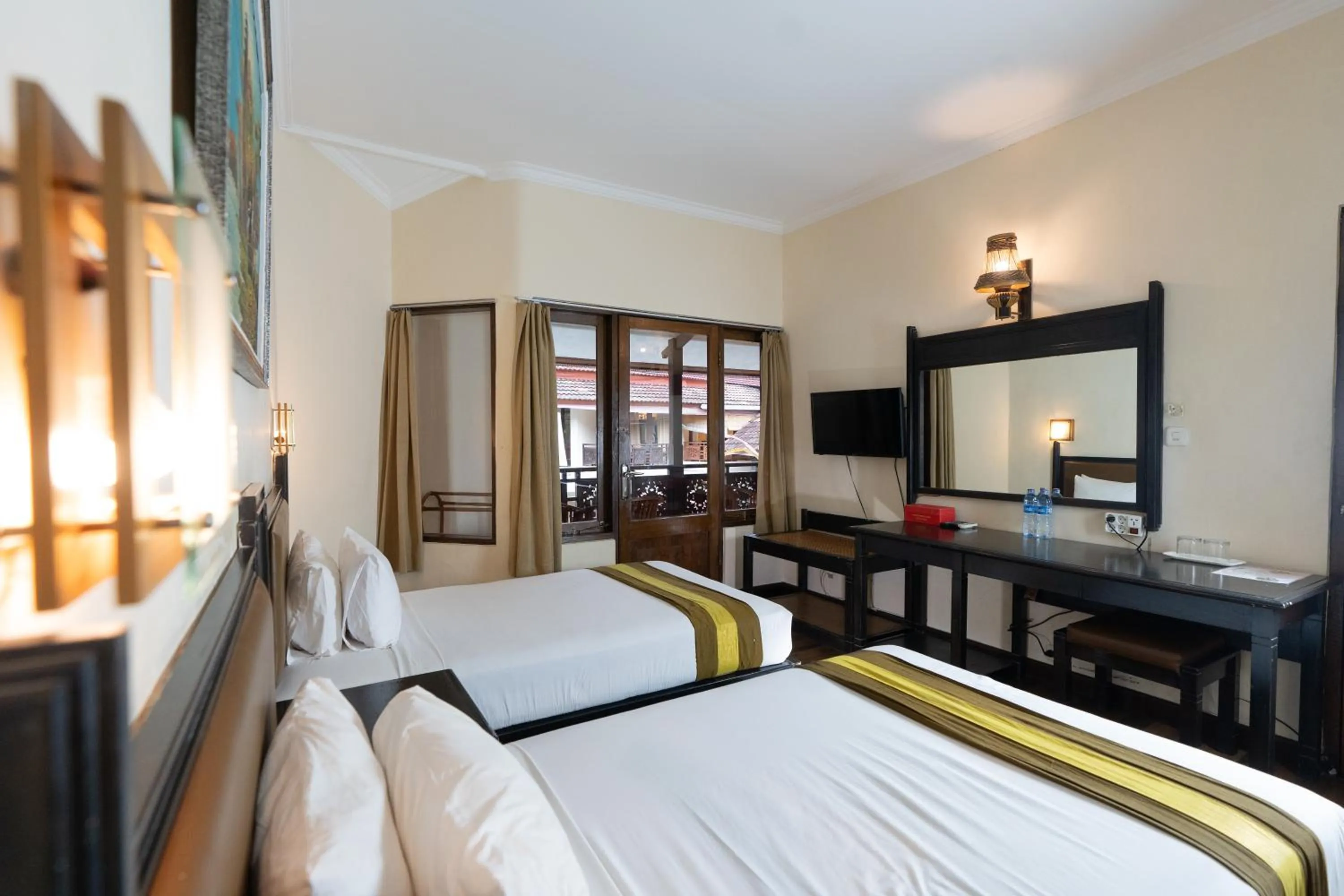 Bed in The Flora Kuta Bali