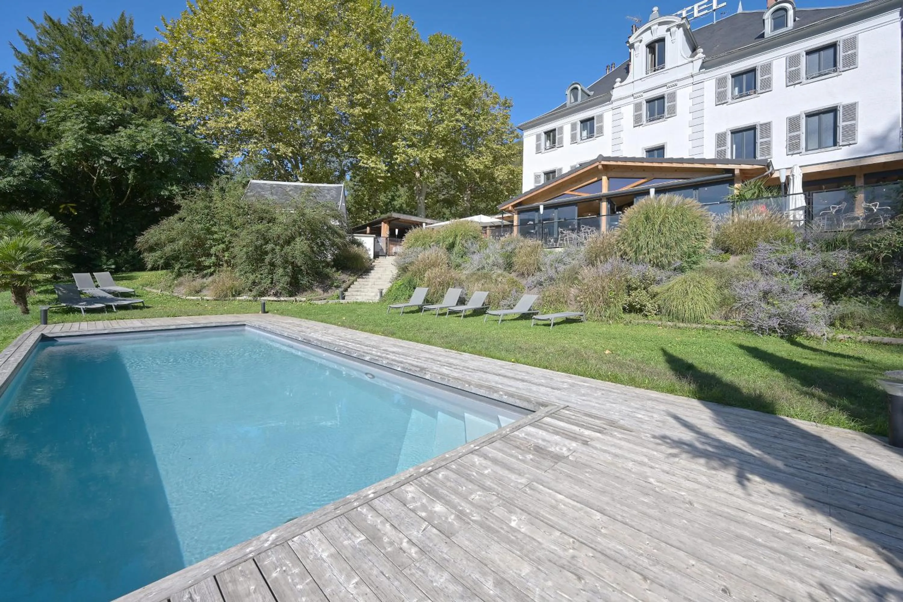 Swimming pool in Hôtel Restaurant Le Repère
