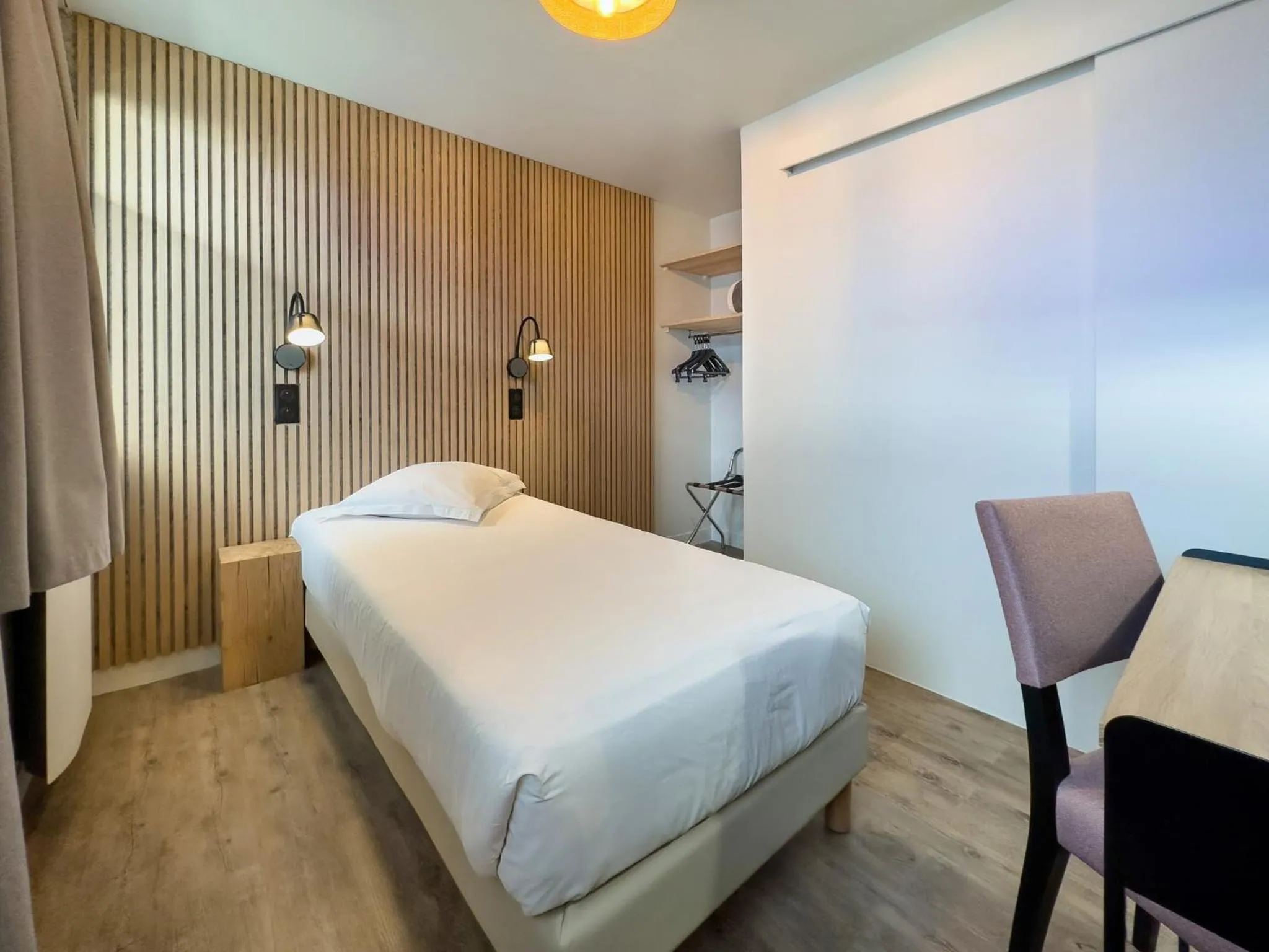 Bed in Hotel De La Gare