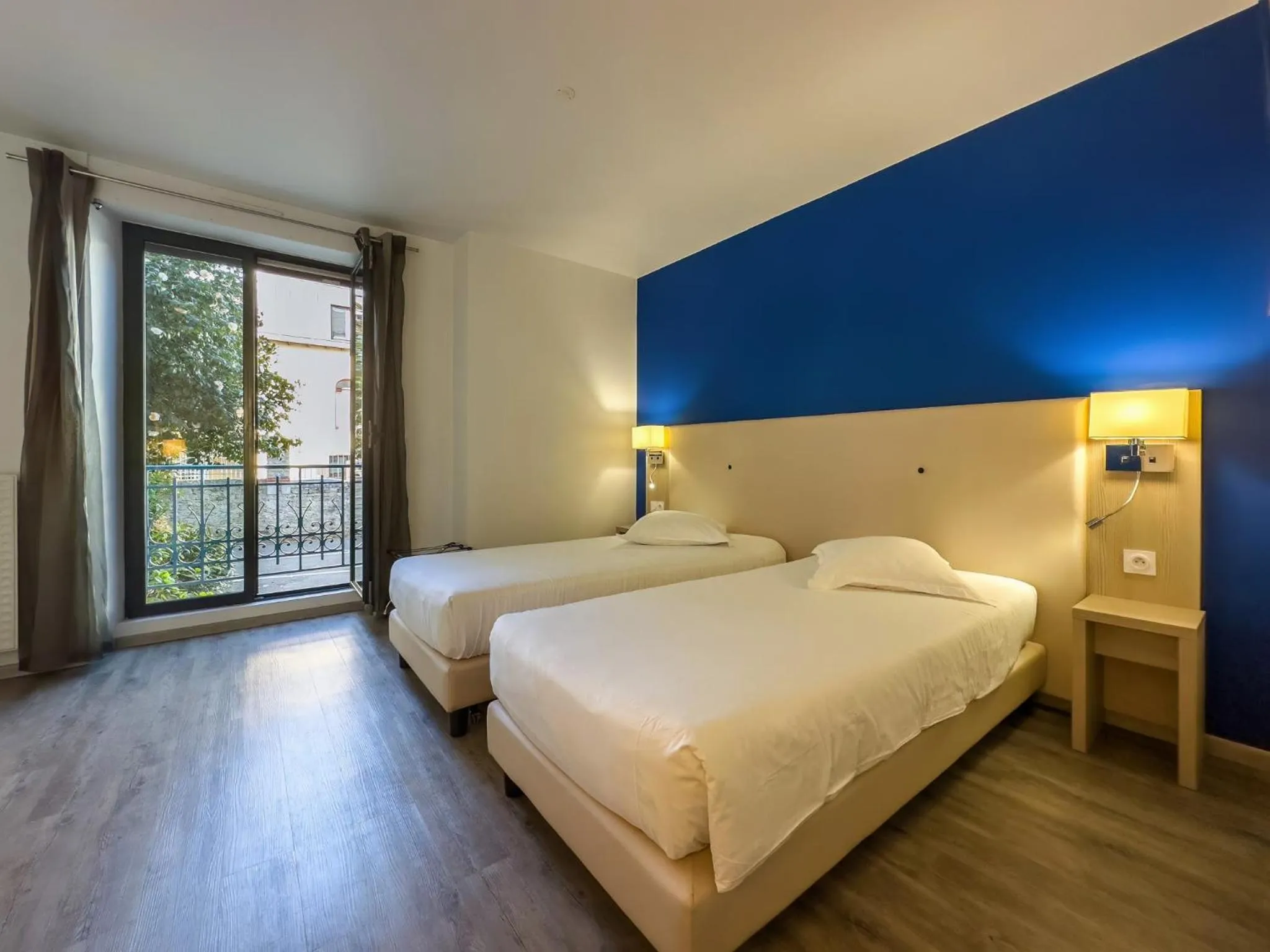 Bed in Hotel De La Gare