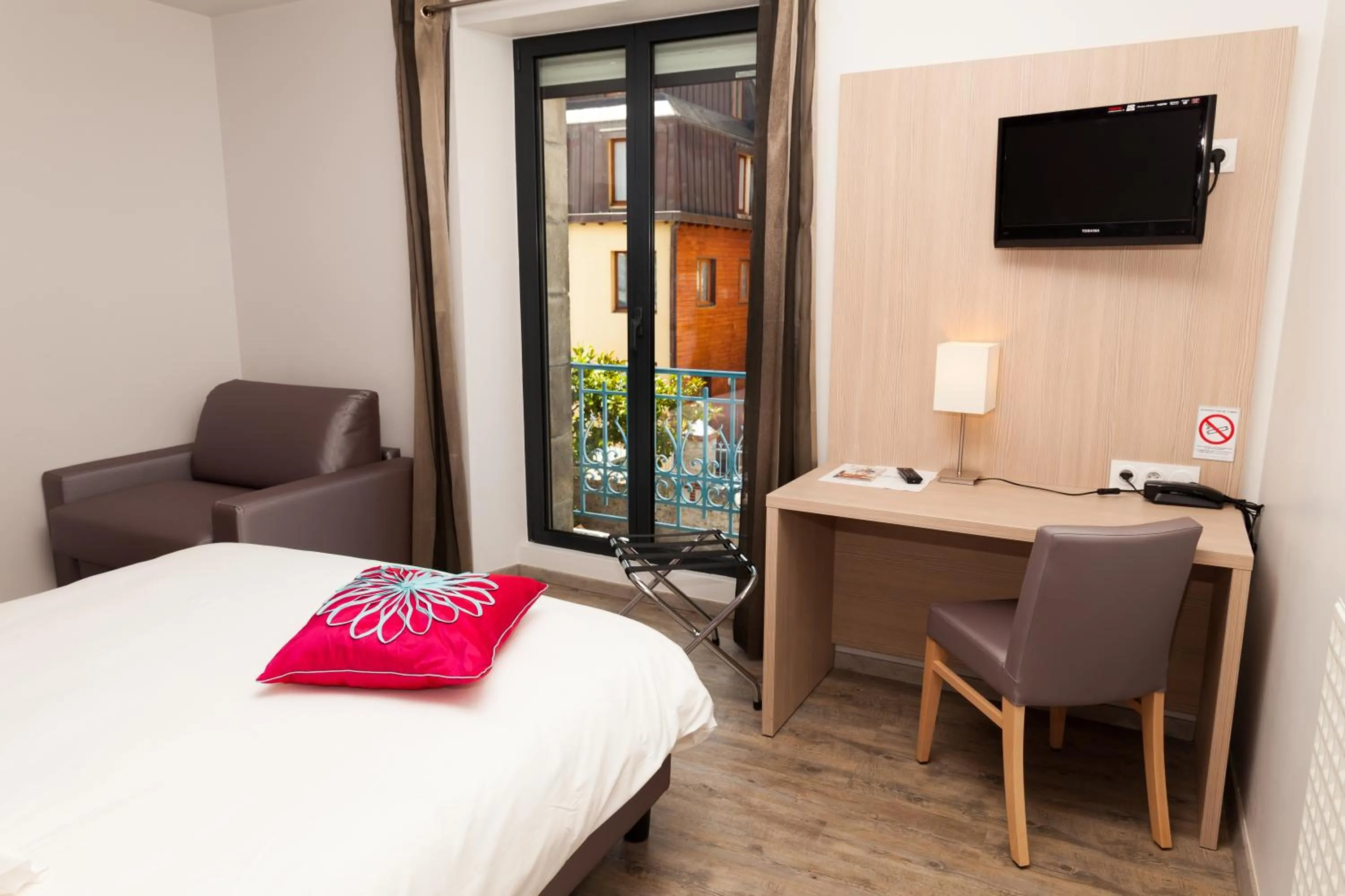 Bed in Hotel De La Gare