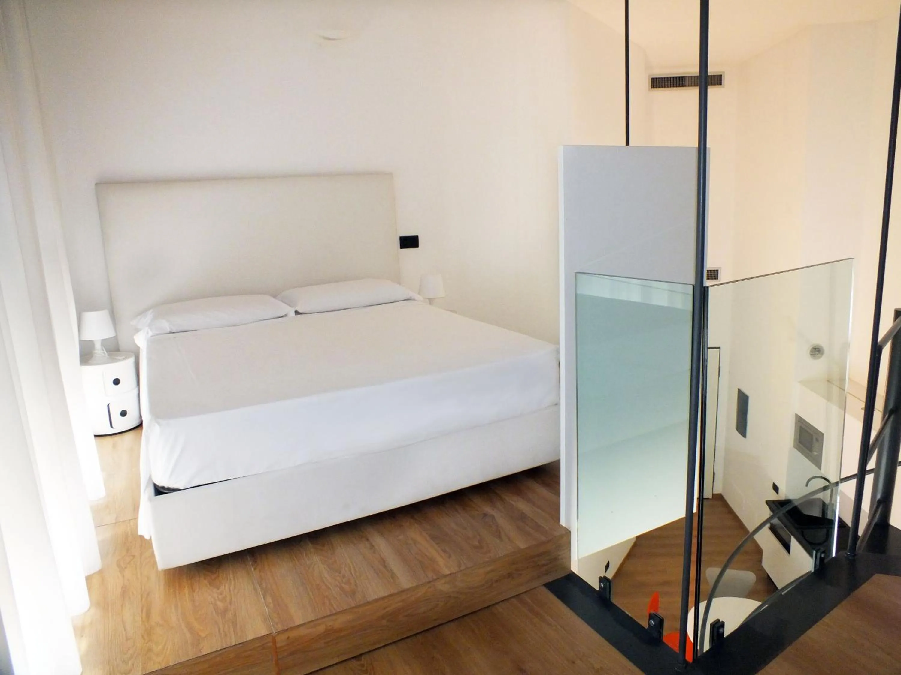 Bed in BB Hotels Aparthotel Isola