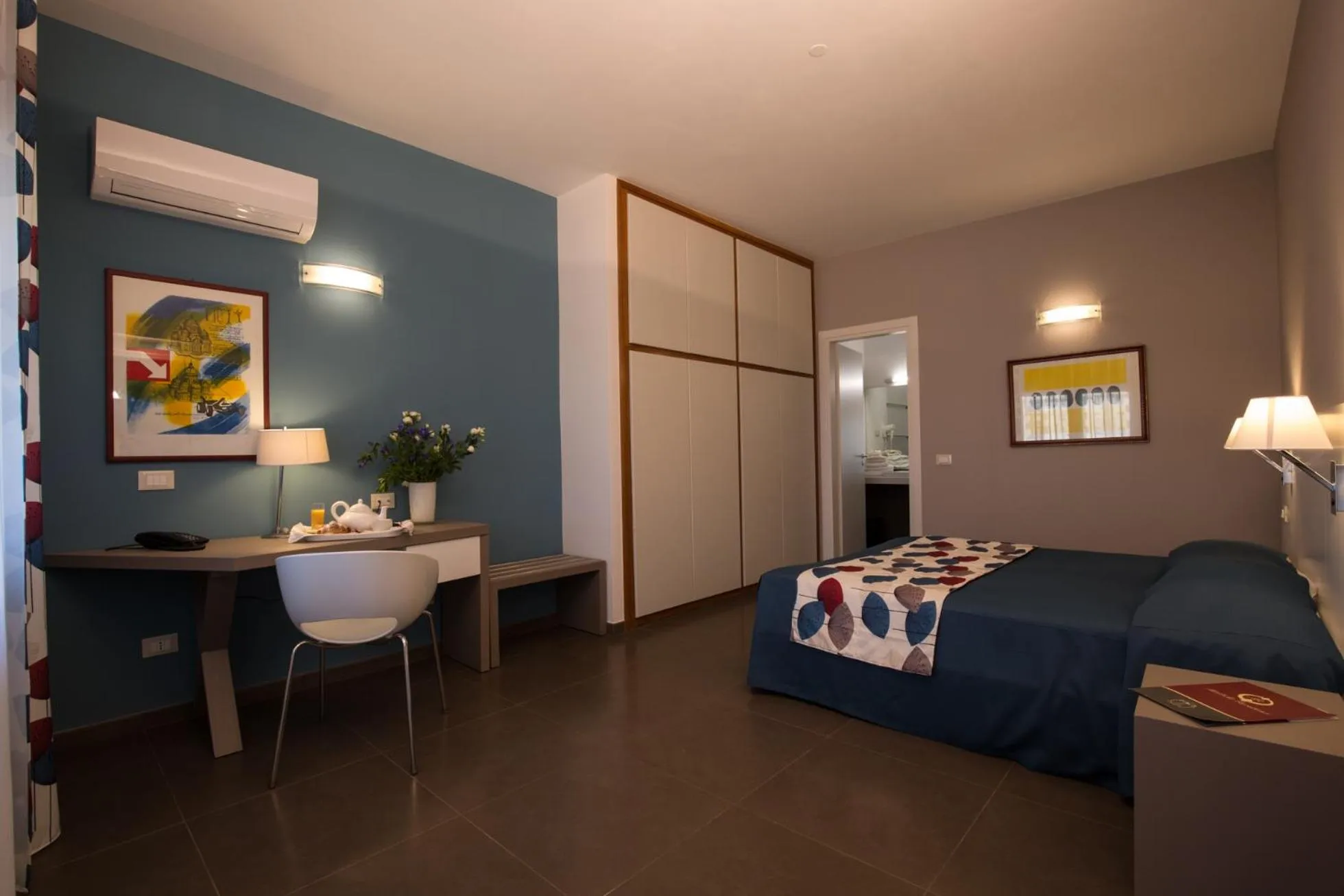 Bed in Marbela Apartments & Suites