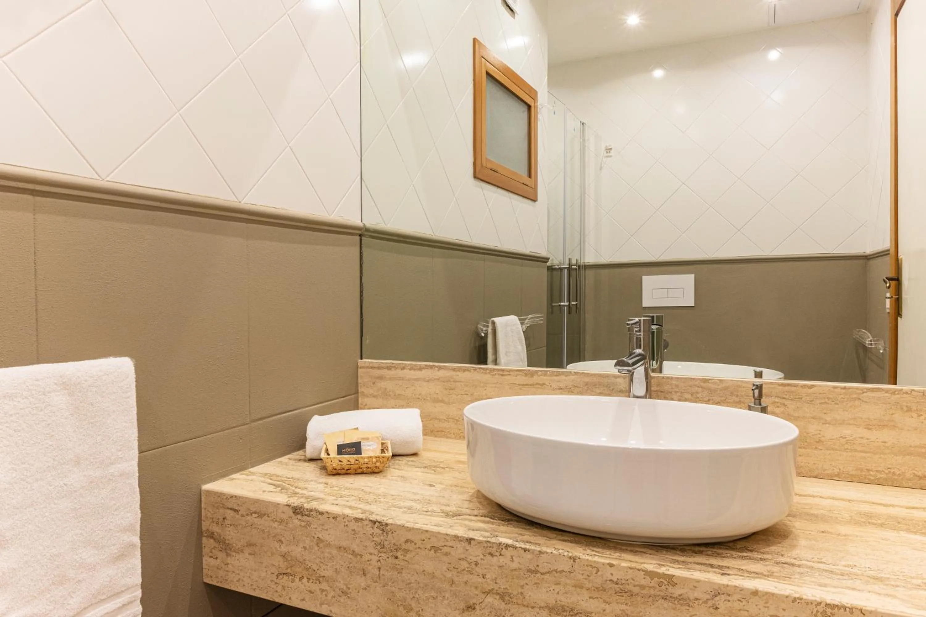 Bathroom in Marbela Apartments & Suites