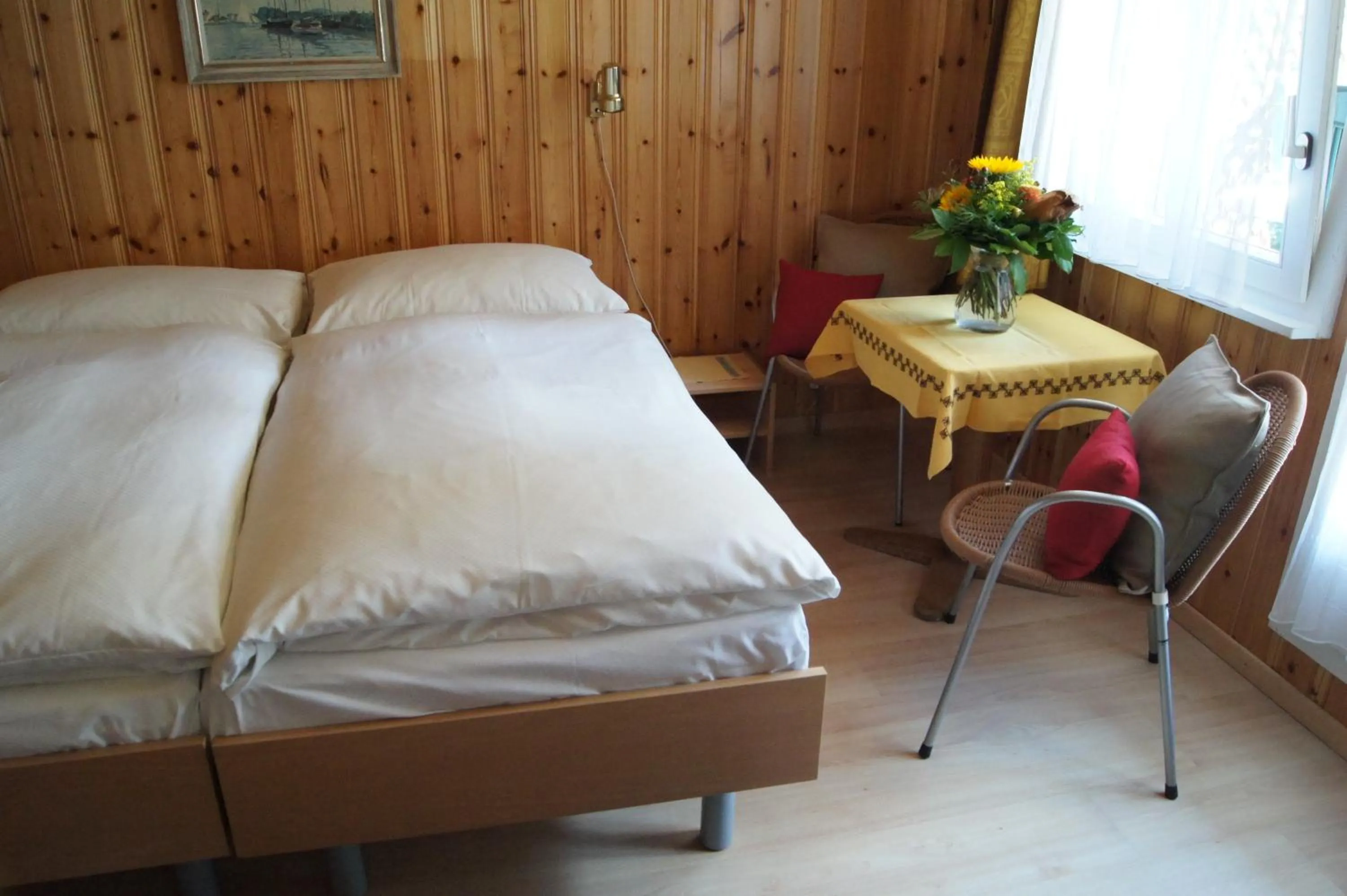 Bed in Hotel Alpina