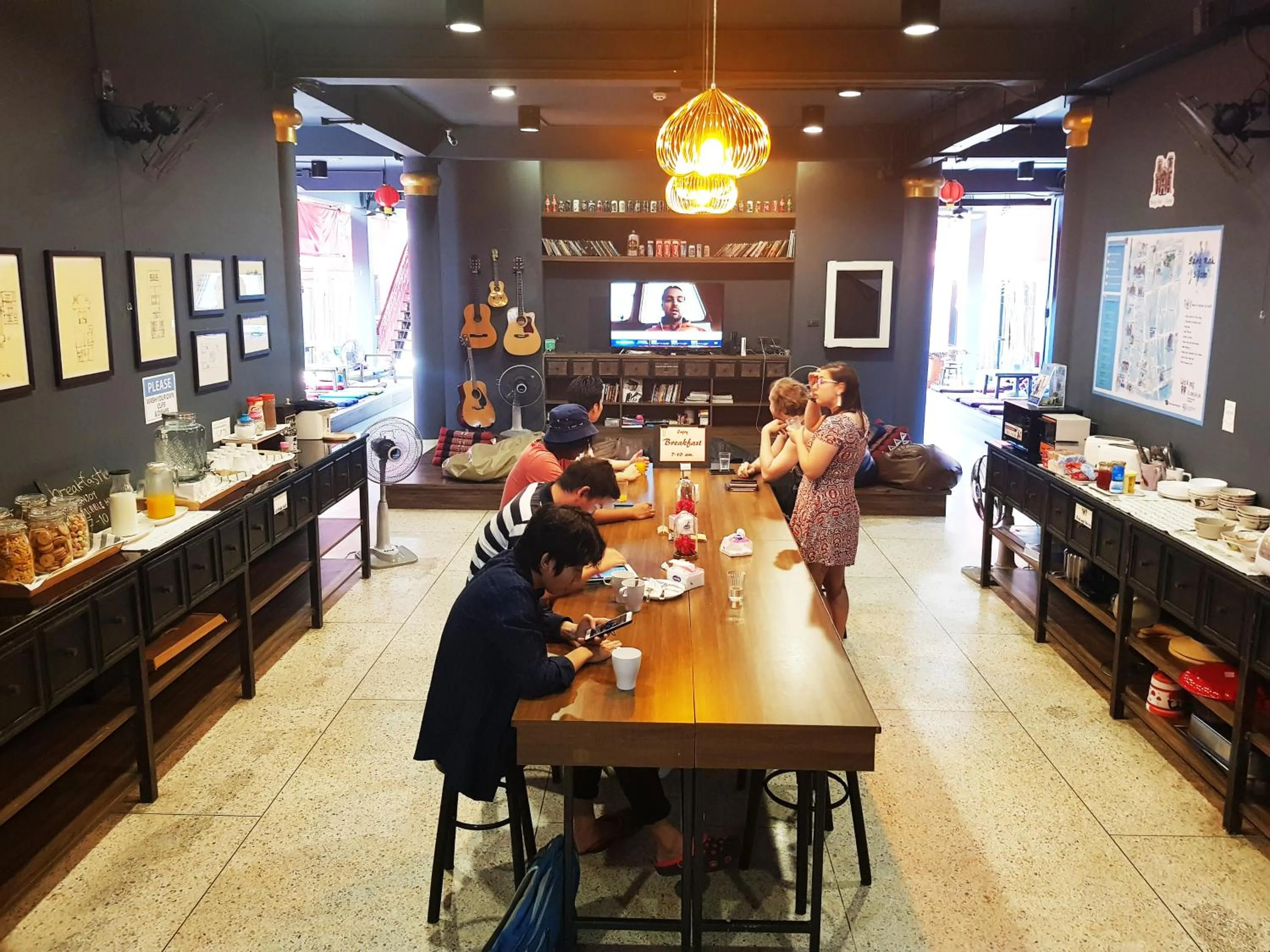 Communal lounge/ TV room in CLOUD on Saladaeng Silom Hostel Bangkok