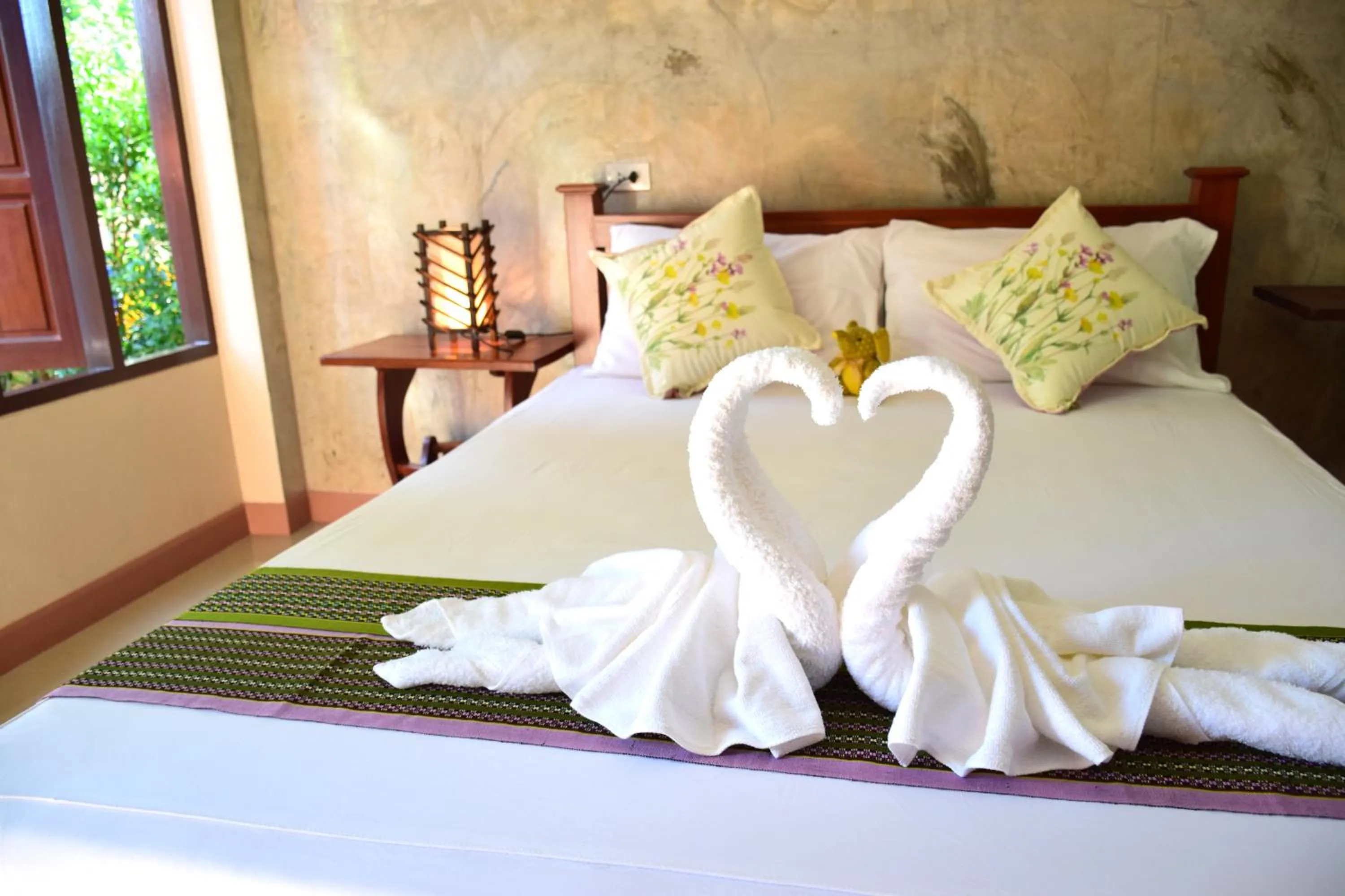 Bed in Siam Guesthouse