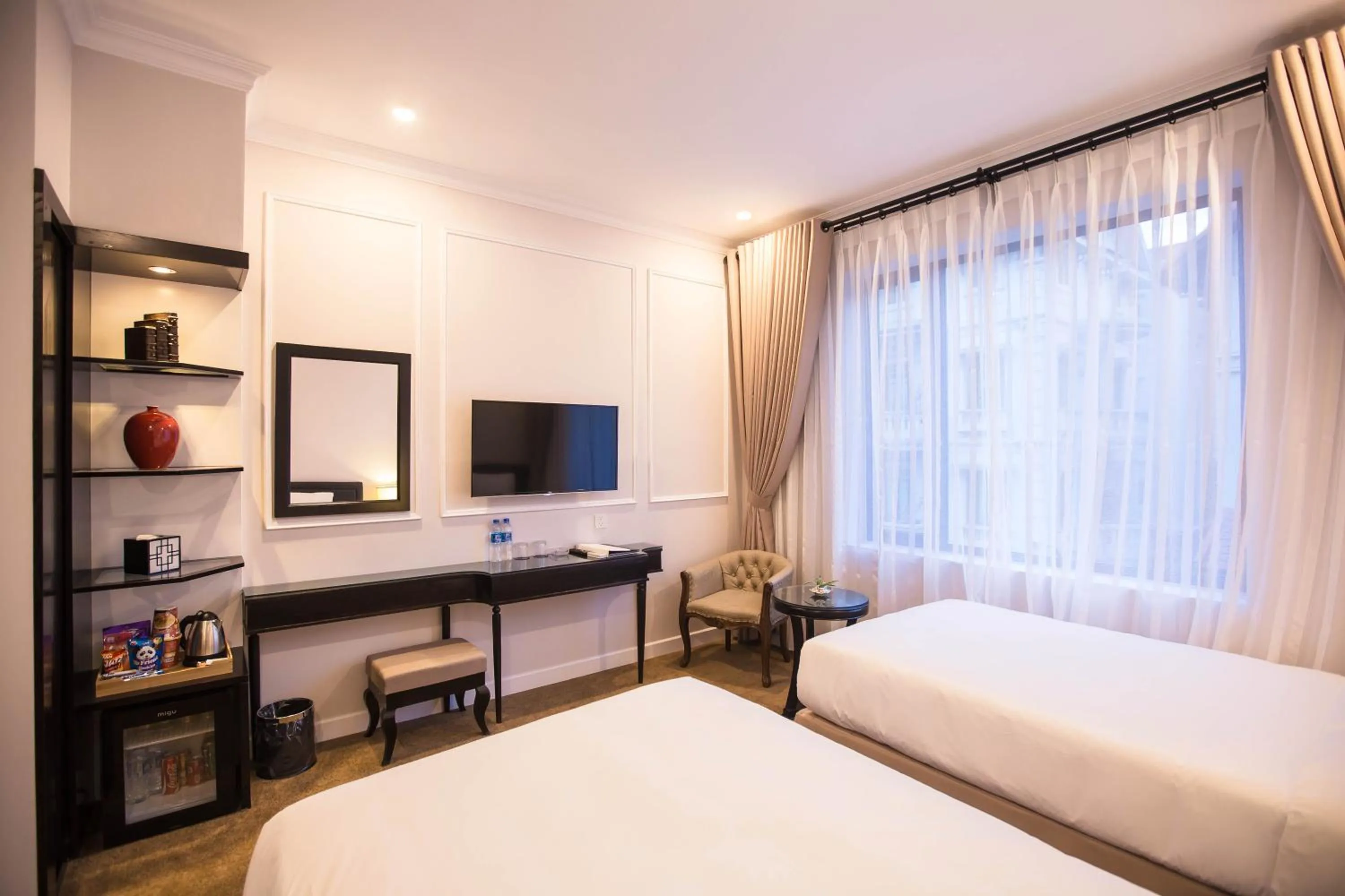TV and multimedia, Bed in Dinh Elegant Hanoi Hotel
