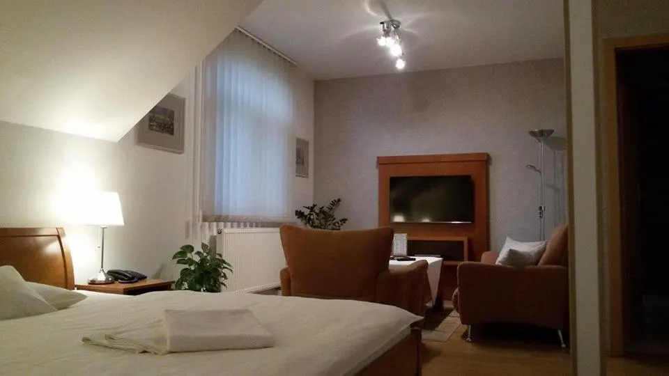 Seating area, Bed in Pension U Labe