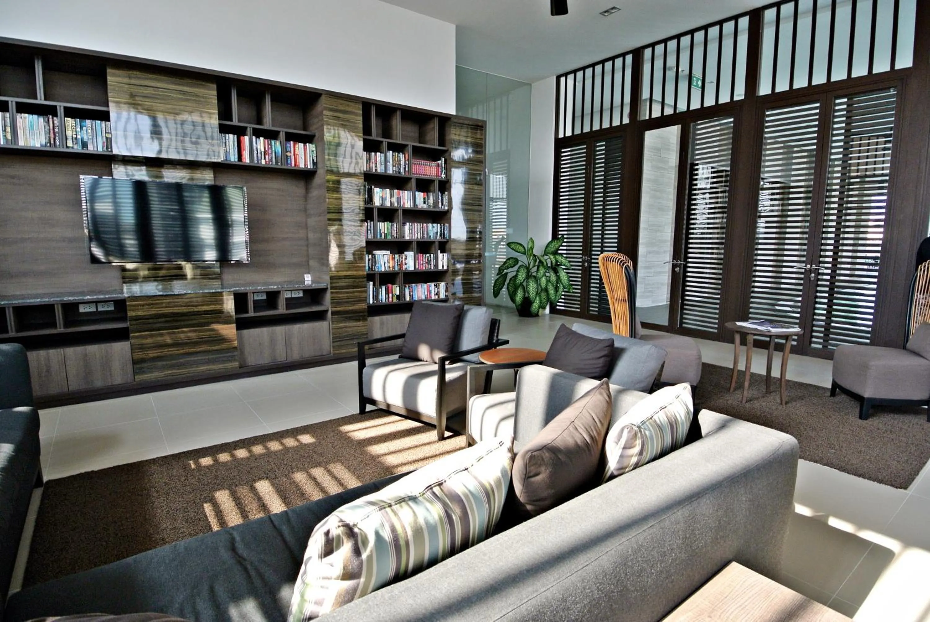 Communal lounge/ TV room in Somerset Park Suanplu Bangkok