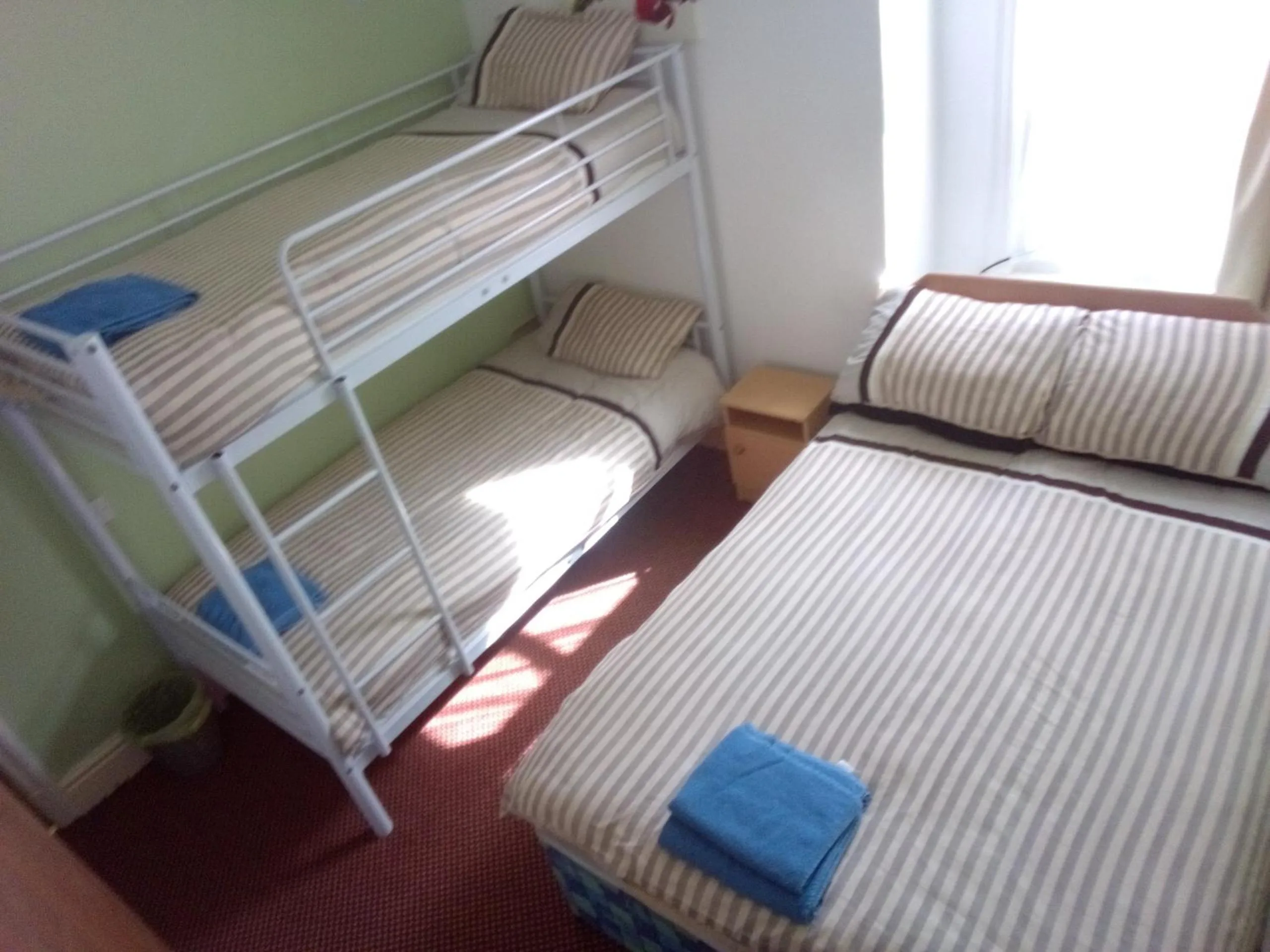 Bed in MyRoomz Golden Strand Hotel