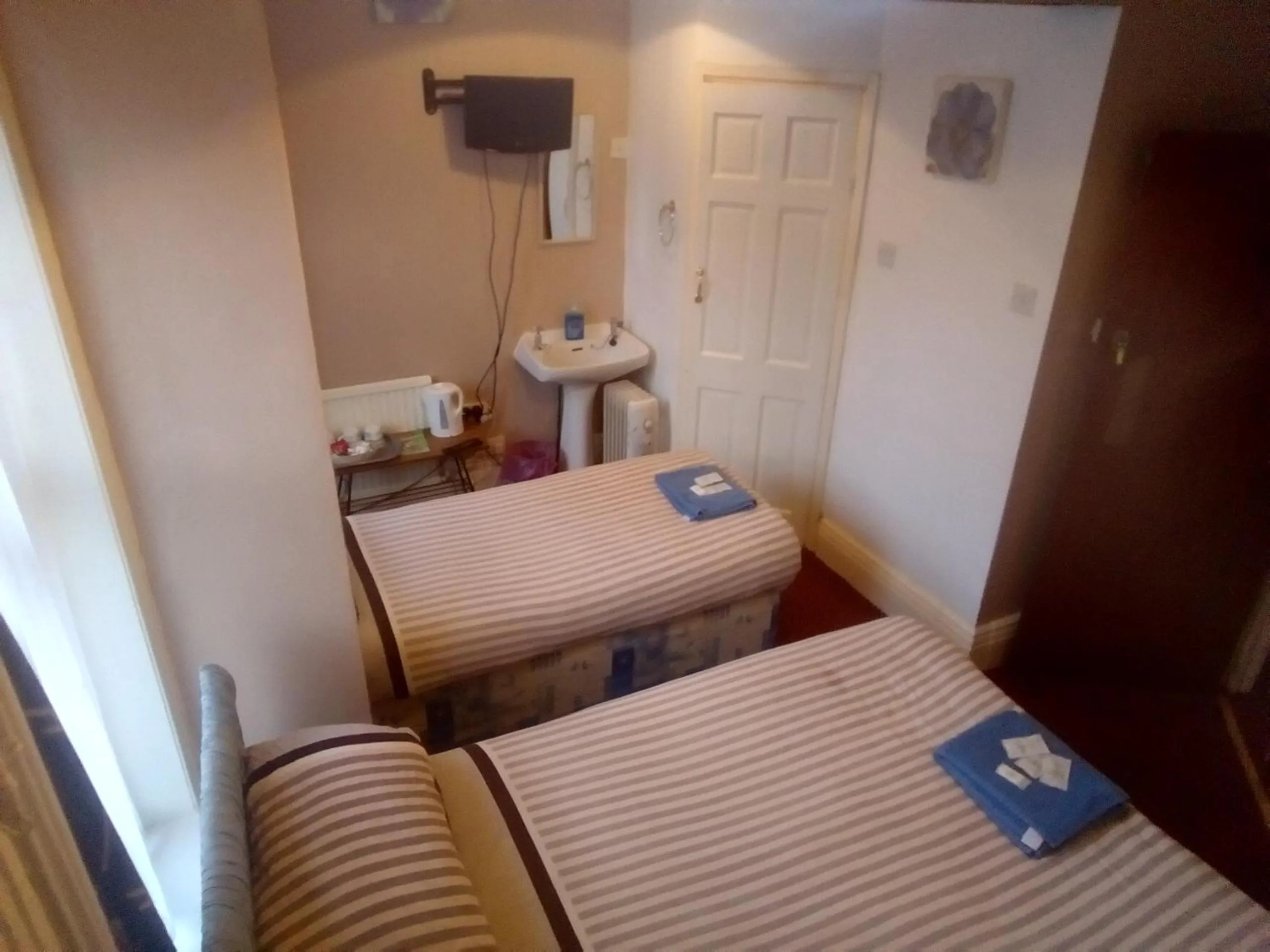 Bed in MyRoomz Golden Strand Hotel