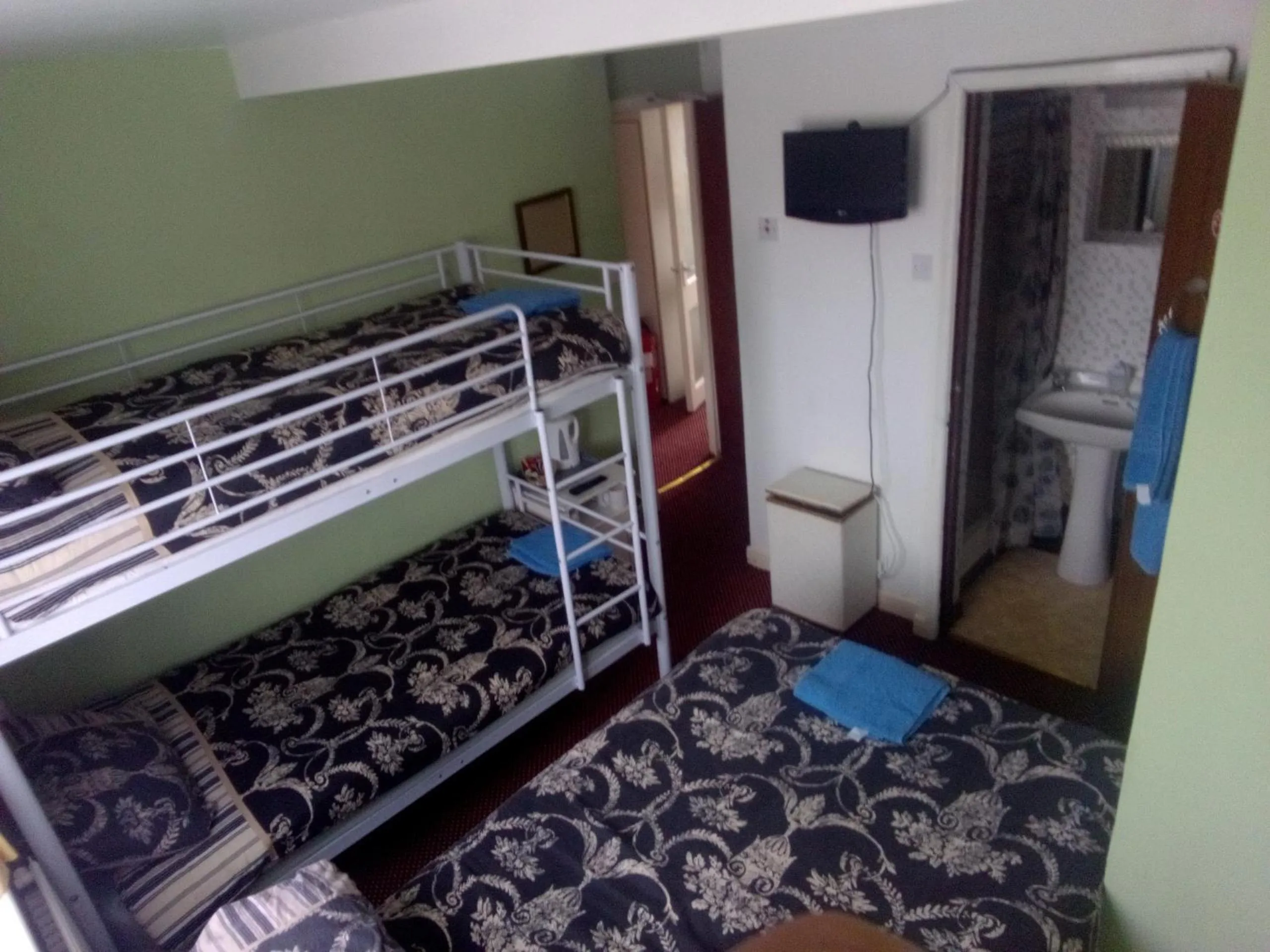 Bed in MyRoomz Golden Strand Hotel