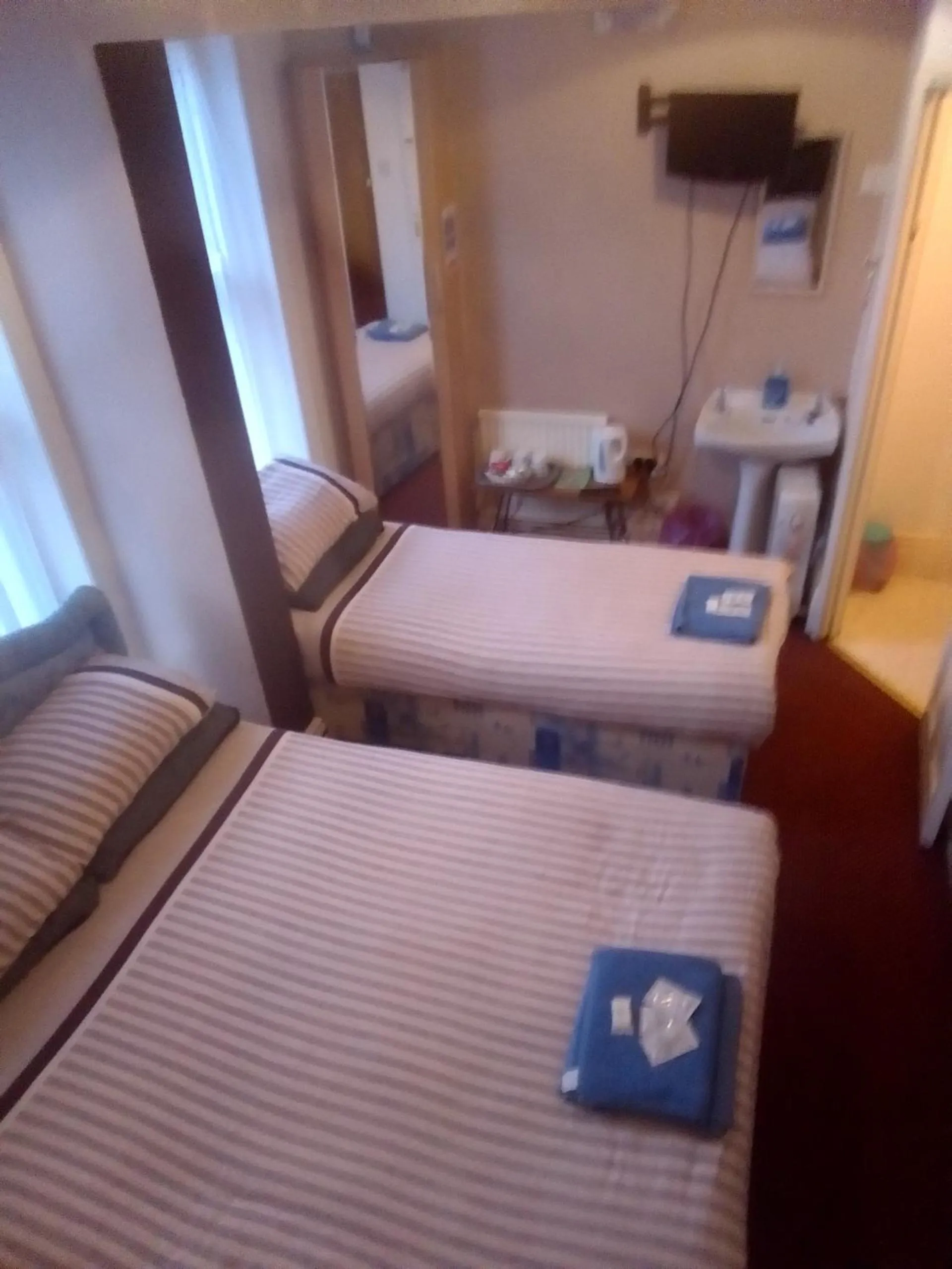 Bed in MyRoomz Golden Strand Hotel