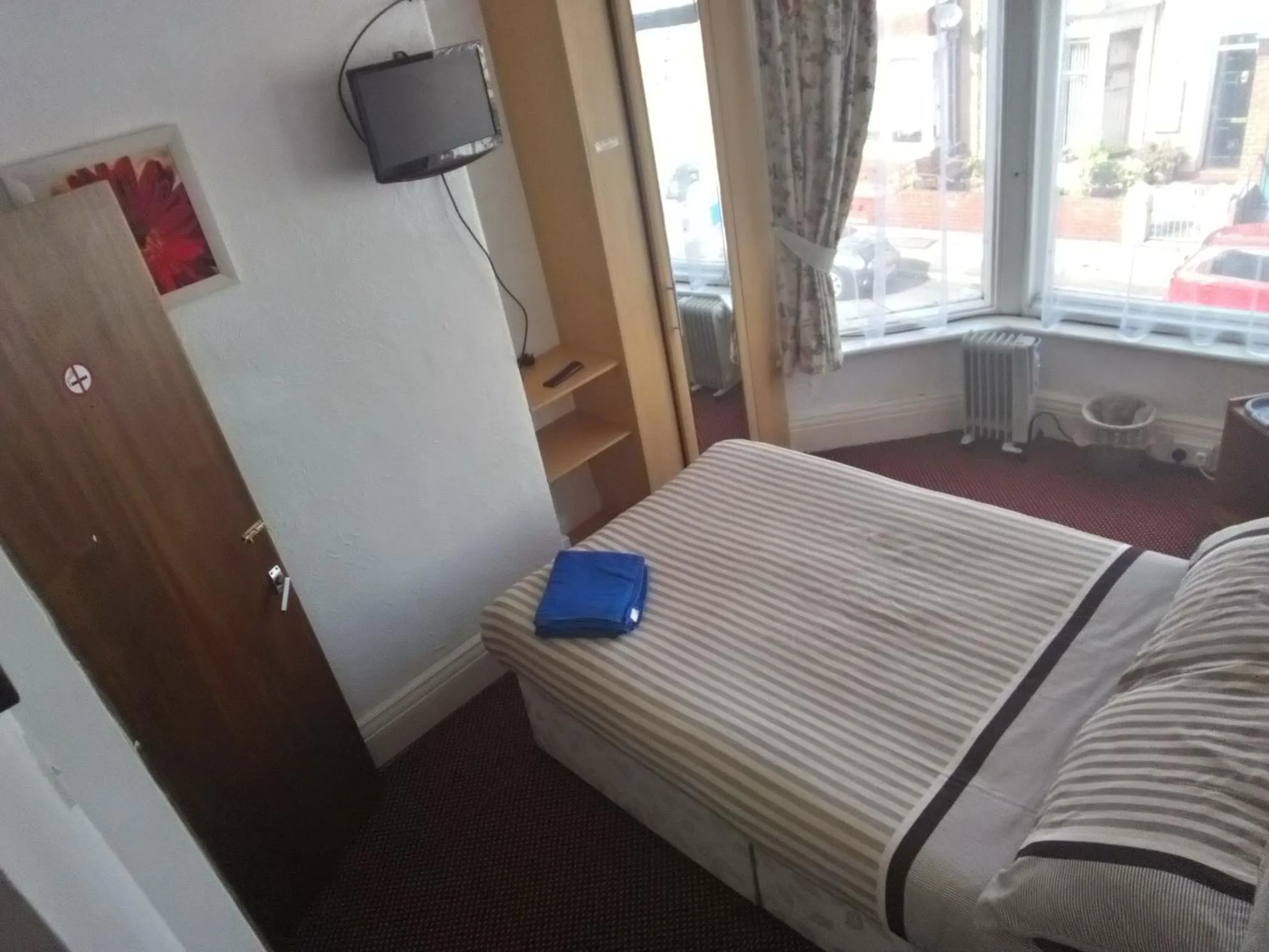 Bed in MyRoomz Golden Strand Hotel