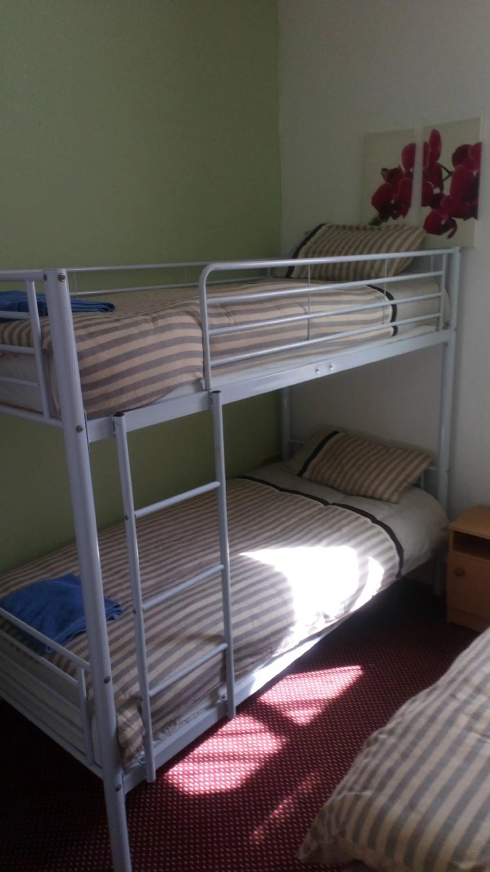 Bed in MyRoomz Golden Strand Hotel