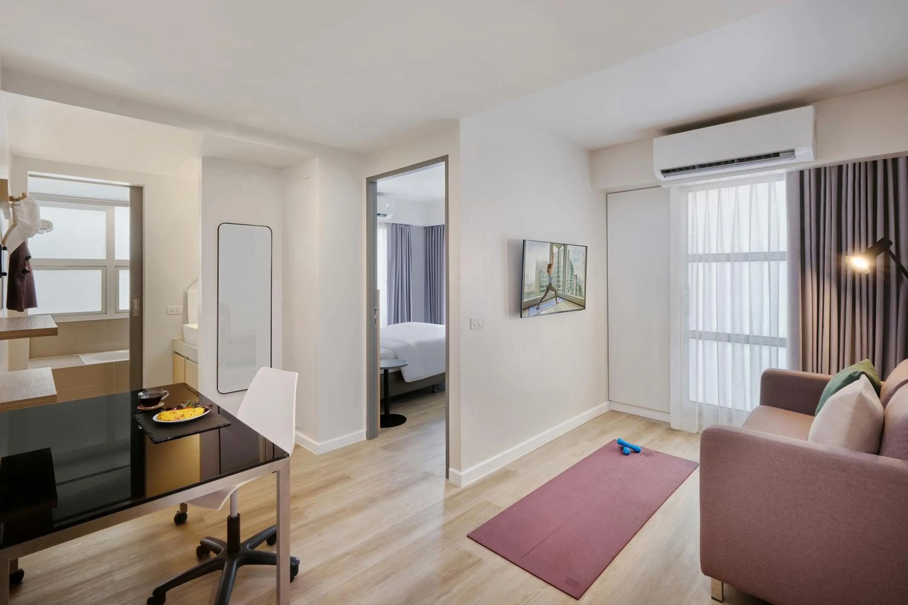 Living room, Bed in Citadines Sukhumvit 16 Bangkok