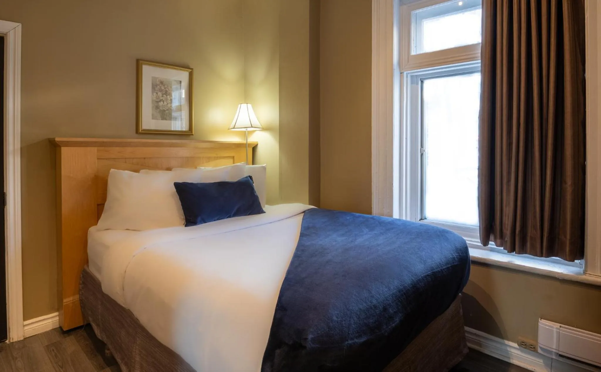 Bed in Hotel Jardin du Gouverneur