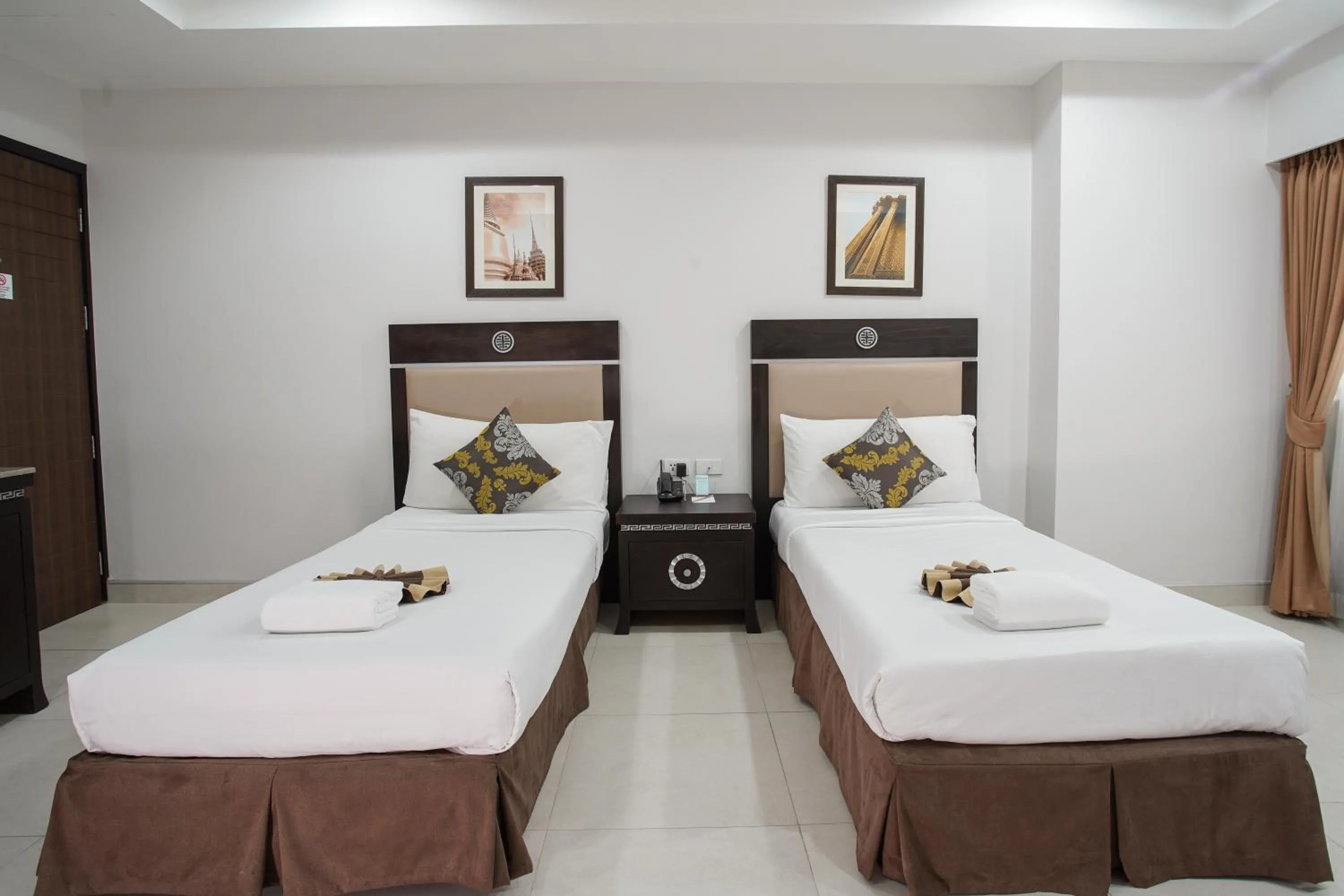 Bed in Club Mahindra Mac Boutique Hotel