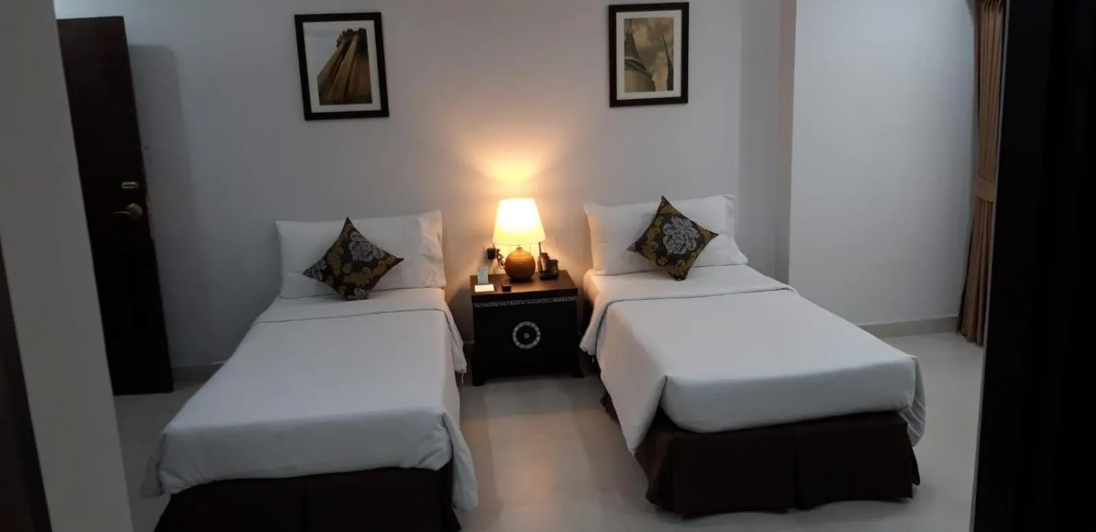 Bed in Club Mahindra Mac Boutique Hotel
