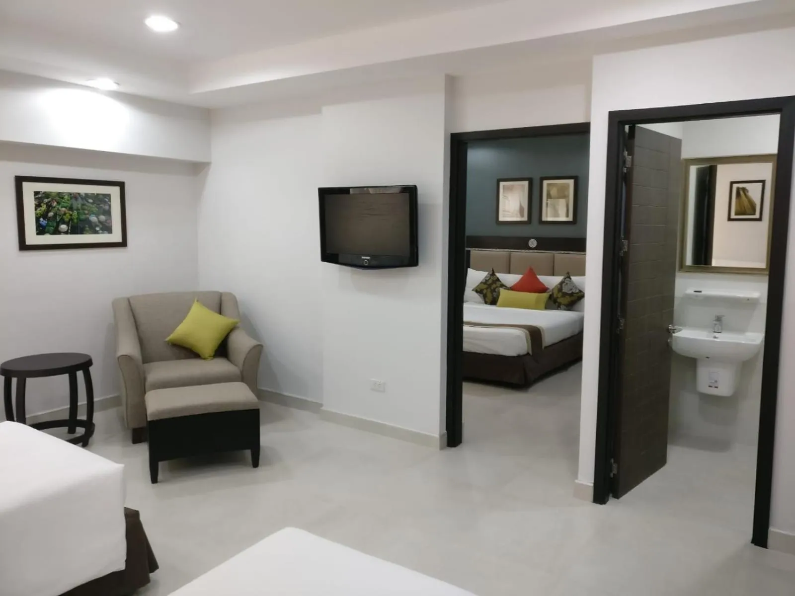 Bed in Club Mahindra Mac Boutique Hotel