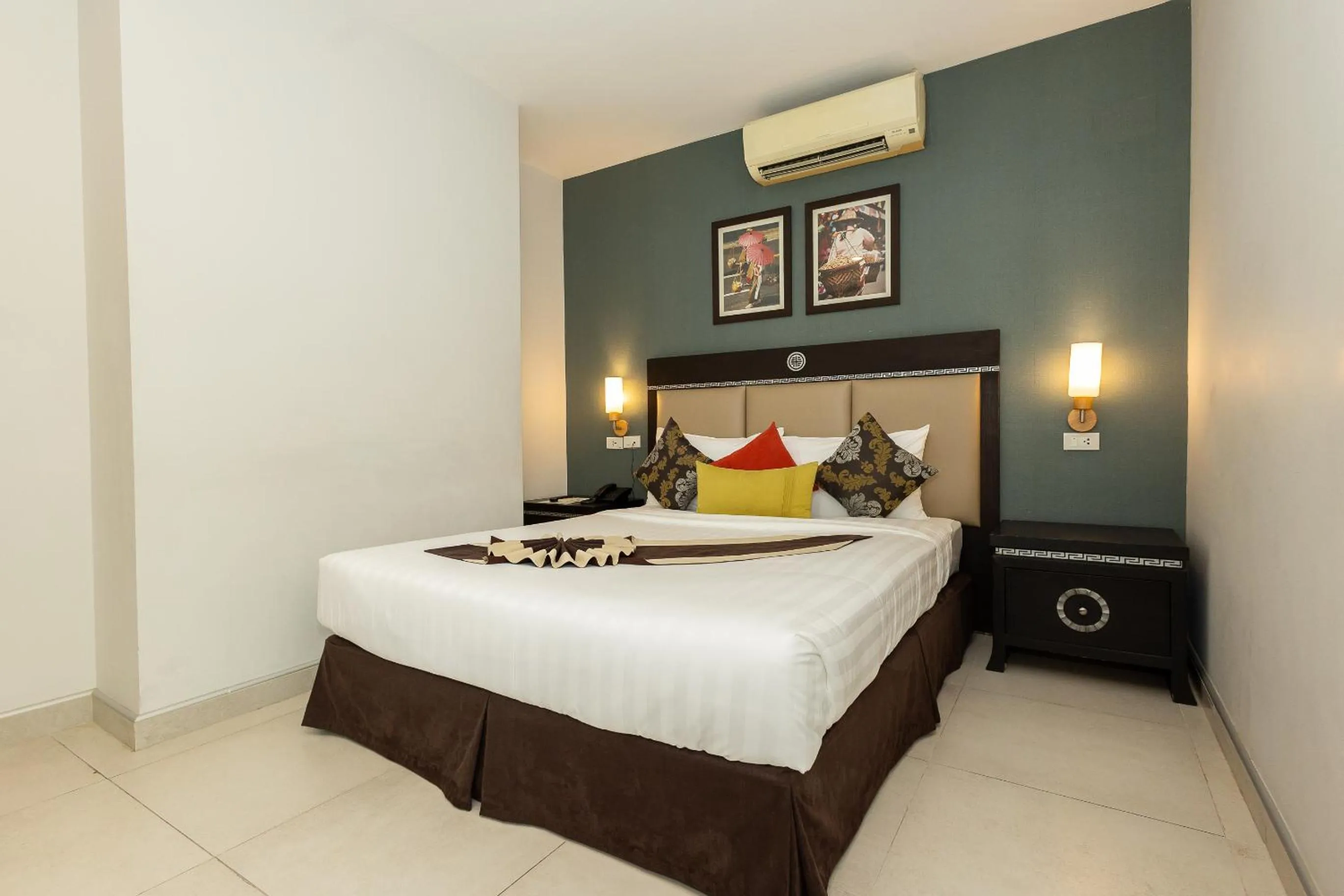 Bed in Club Mahindra Mac Boutique Hotel