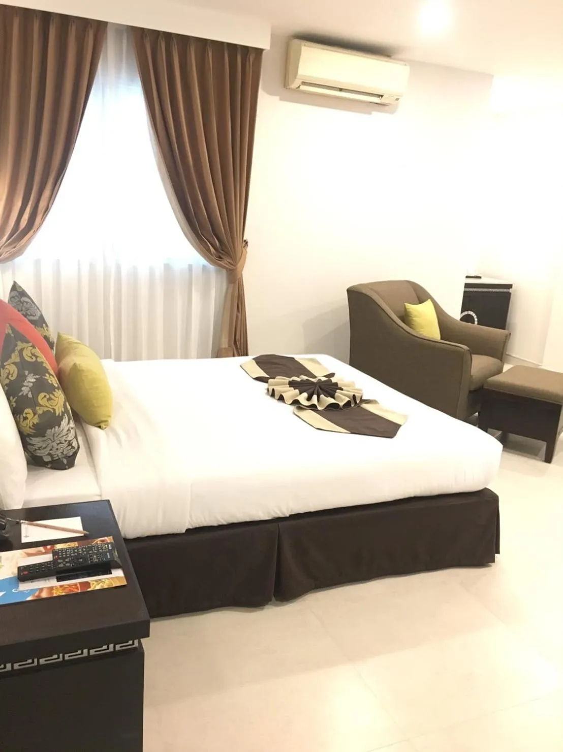 Bed in Club Mahindra Mac Boutique Hotel