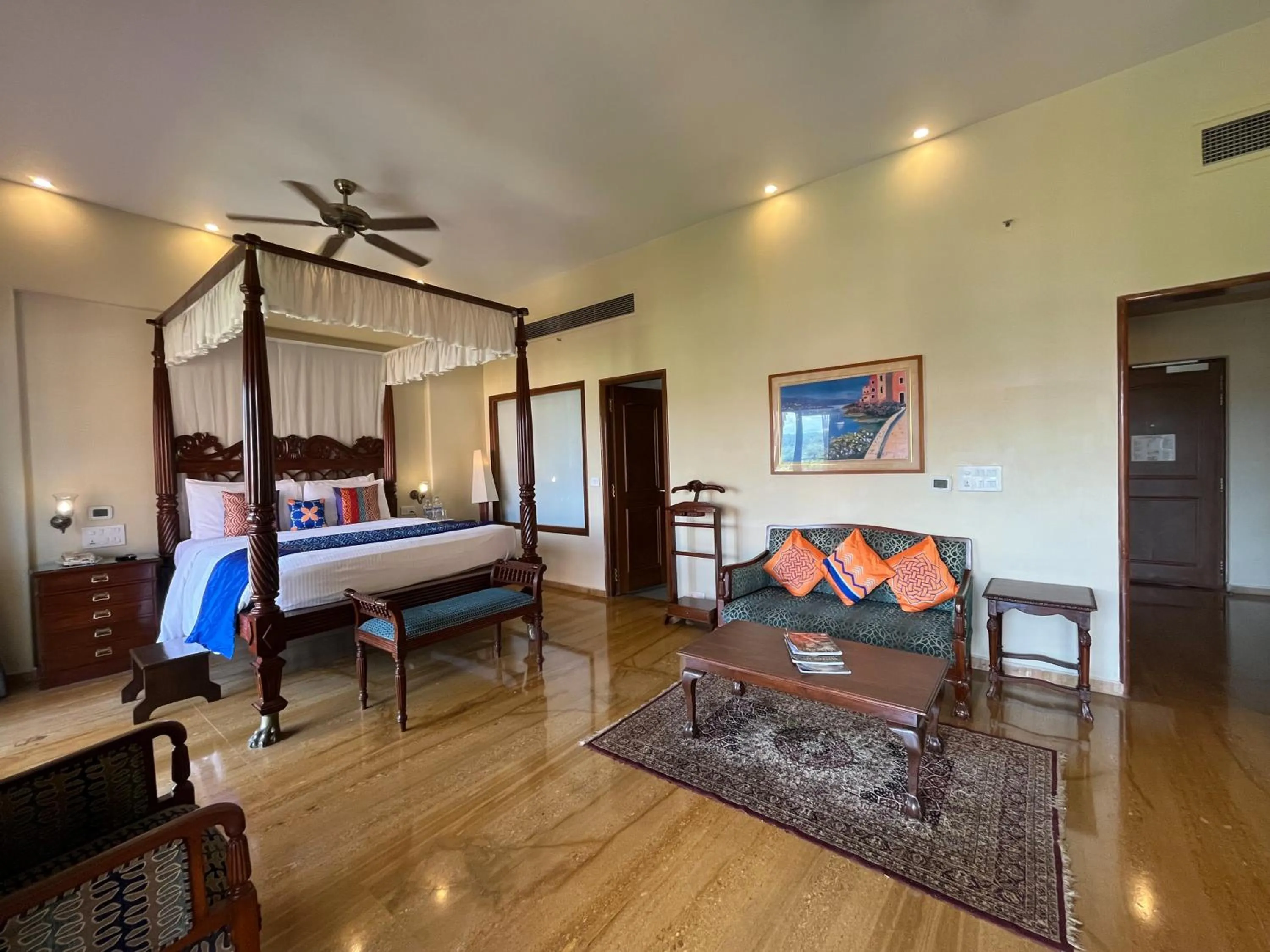 Seating area, Bed in Acron Candolim Regina