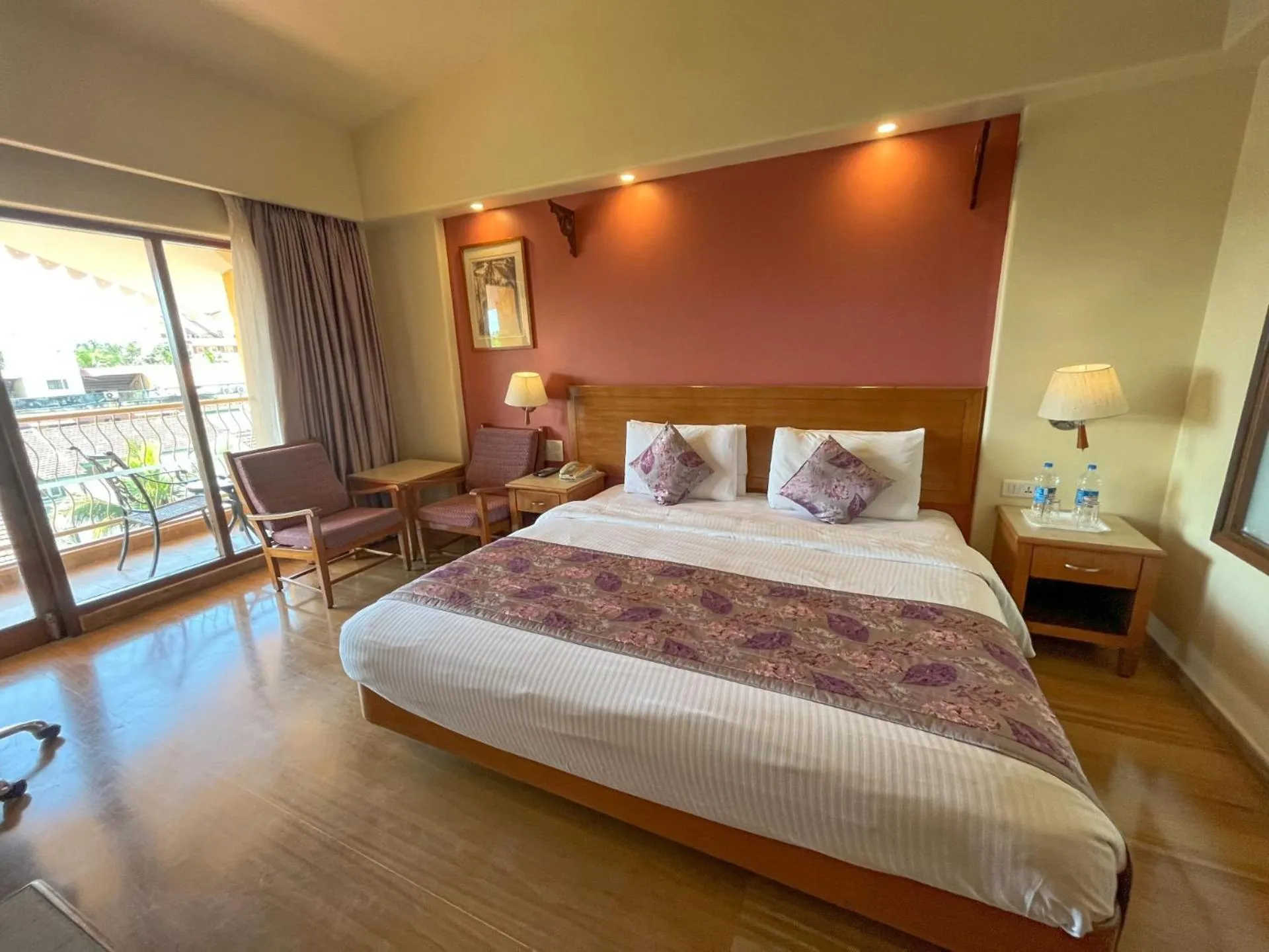 Photo of the whole room, Bed in Acron Candolim Regina