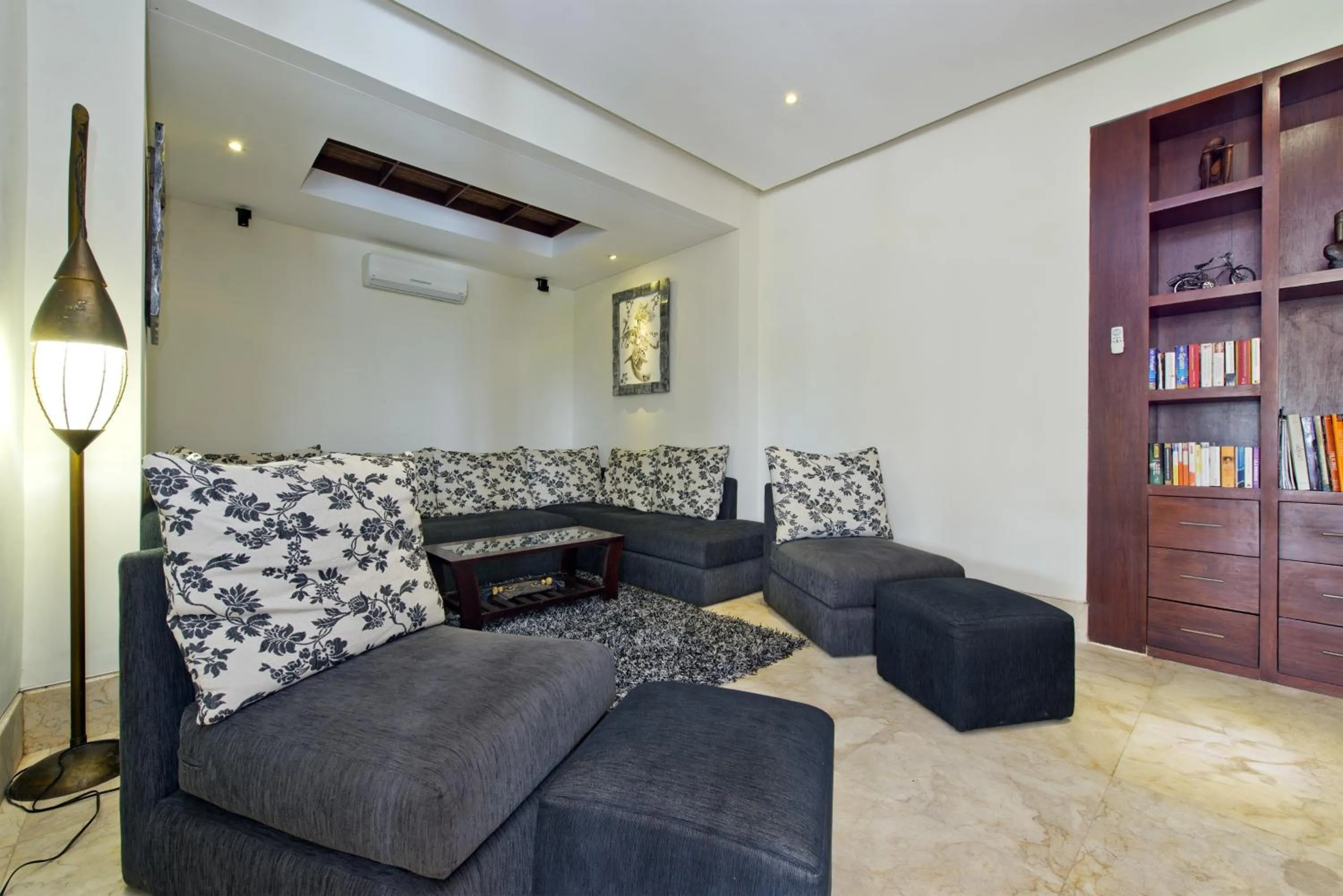 Communal lounge/ TV room in Adiwana Dara Ayu Villas