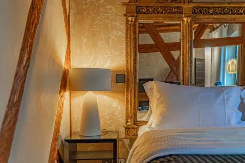 Bed in Le B. Suites, Chambres & Restaurant