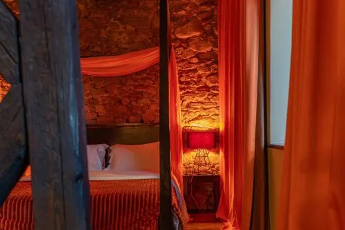 Bed in Le B. Suites, Chambres & Restaurant