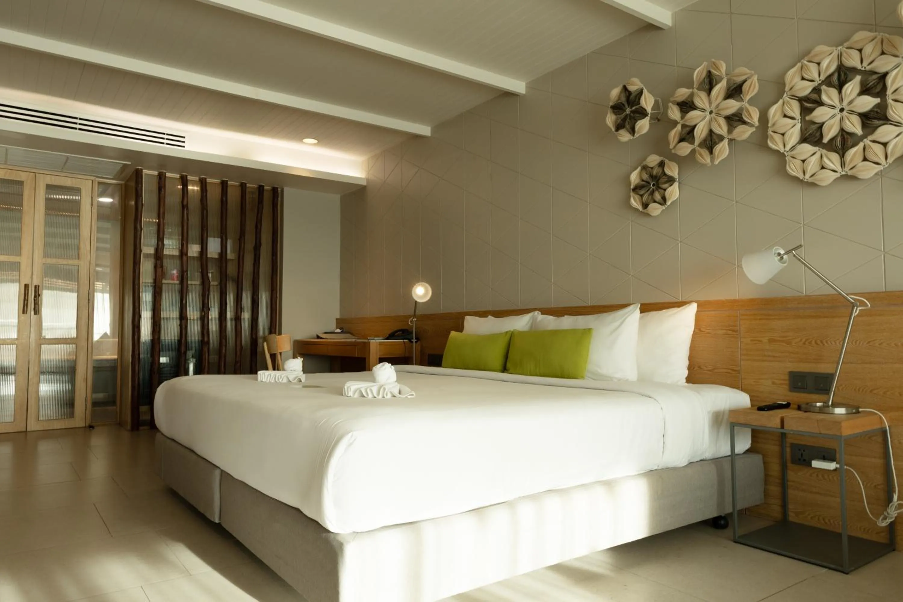 Bed in Andaman Cannacia Resort & Spa - SHA Extra Plus