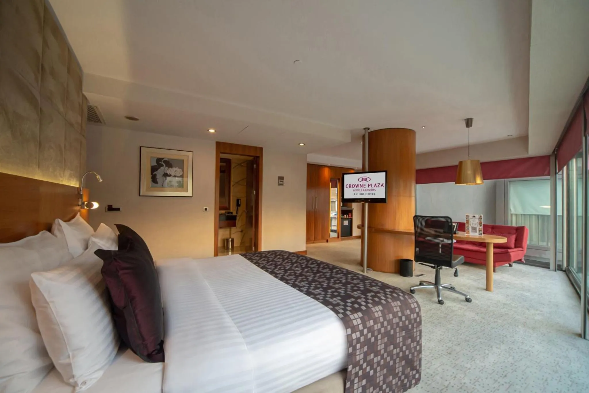 Photo of the whole room, Bed in Crowne Plaza Istanbul Harbiye by IHG