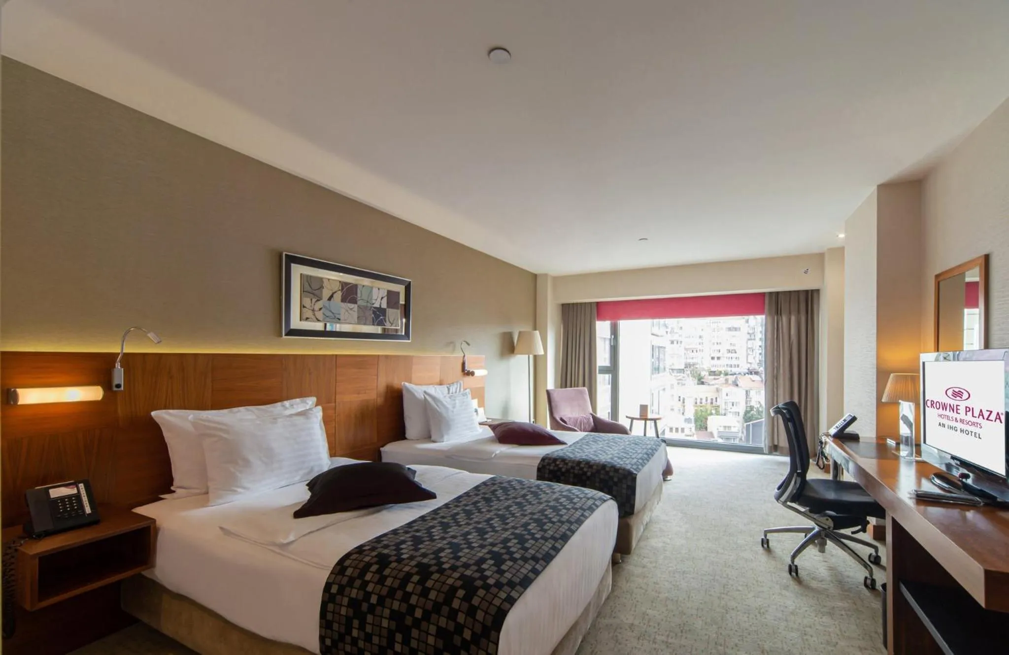 Photo of the whole room, Bed in Crowne Plaza Istanbul Harbiye by IHG