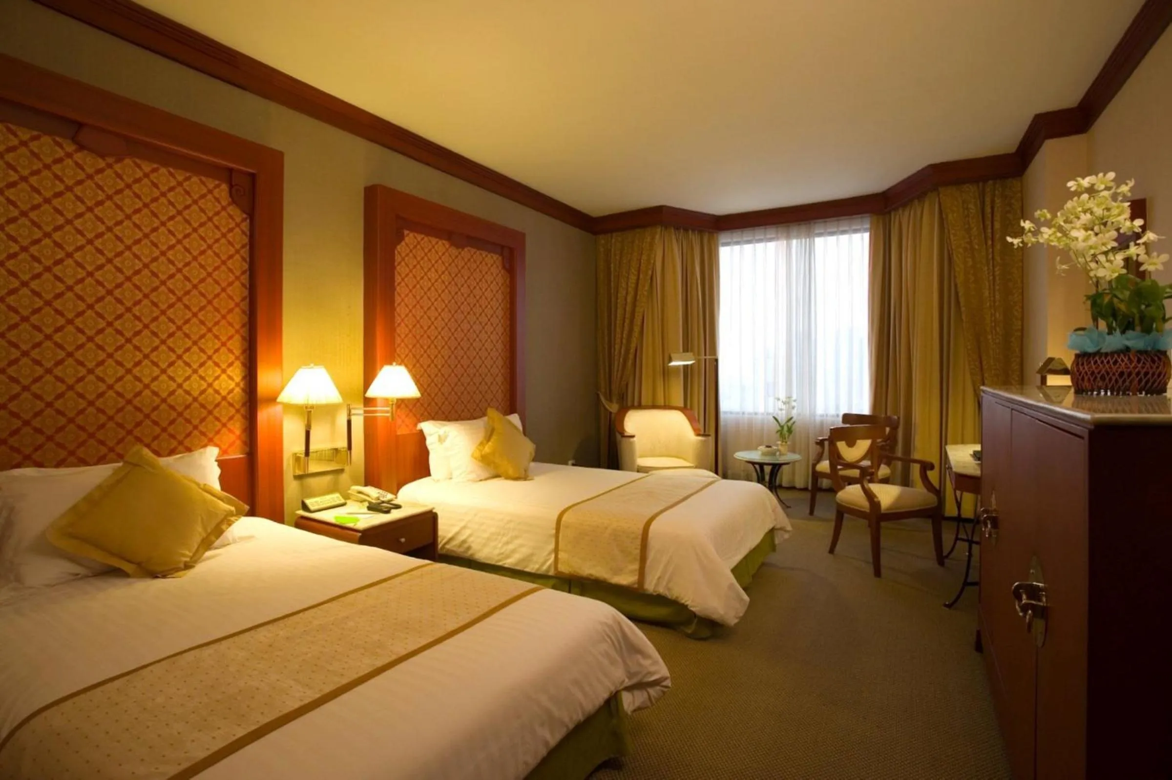 Bed in Ramada by Wyndham Bangkok Chaophya Park