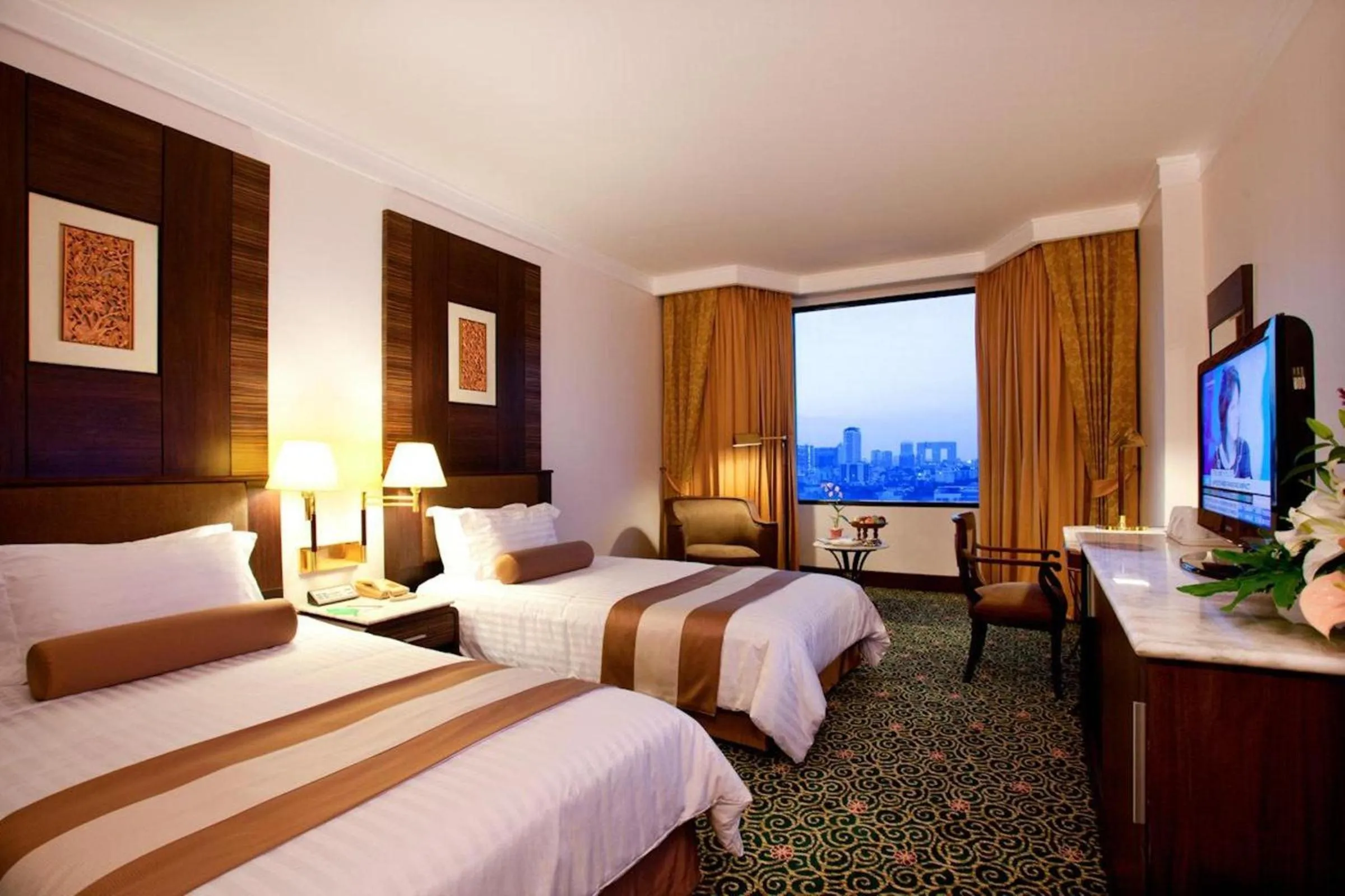 Bed in Ramada by Wyndham Bangkok Chaophya Park