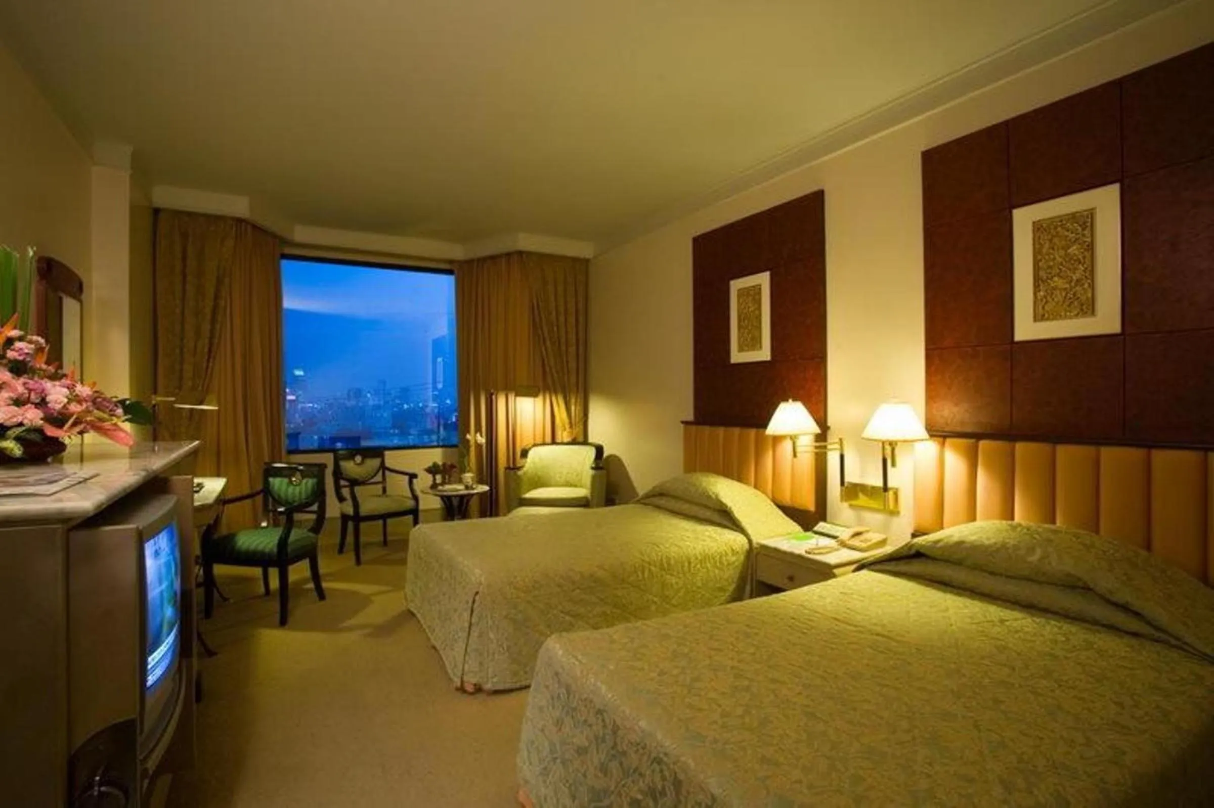 Bed in Ramada by Wyndham Bangkok Chaophya Park