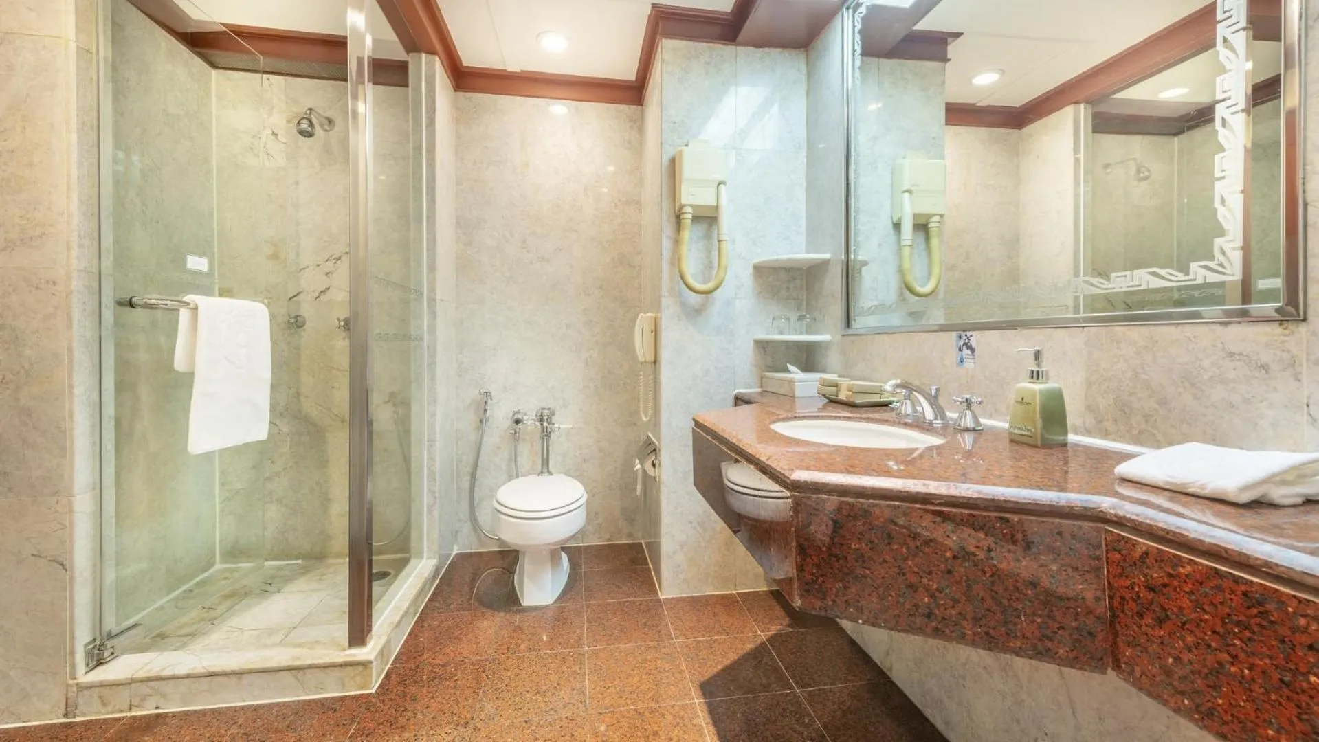 Bathroom in Ramada by Wyndham Bangkok Chaophya Park