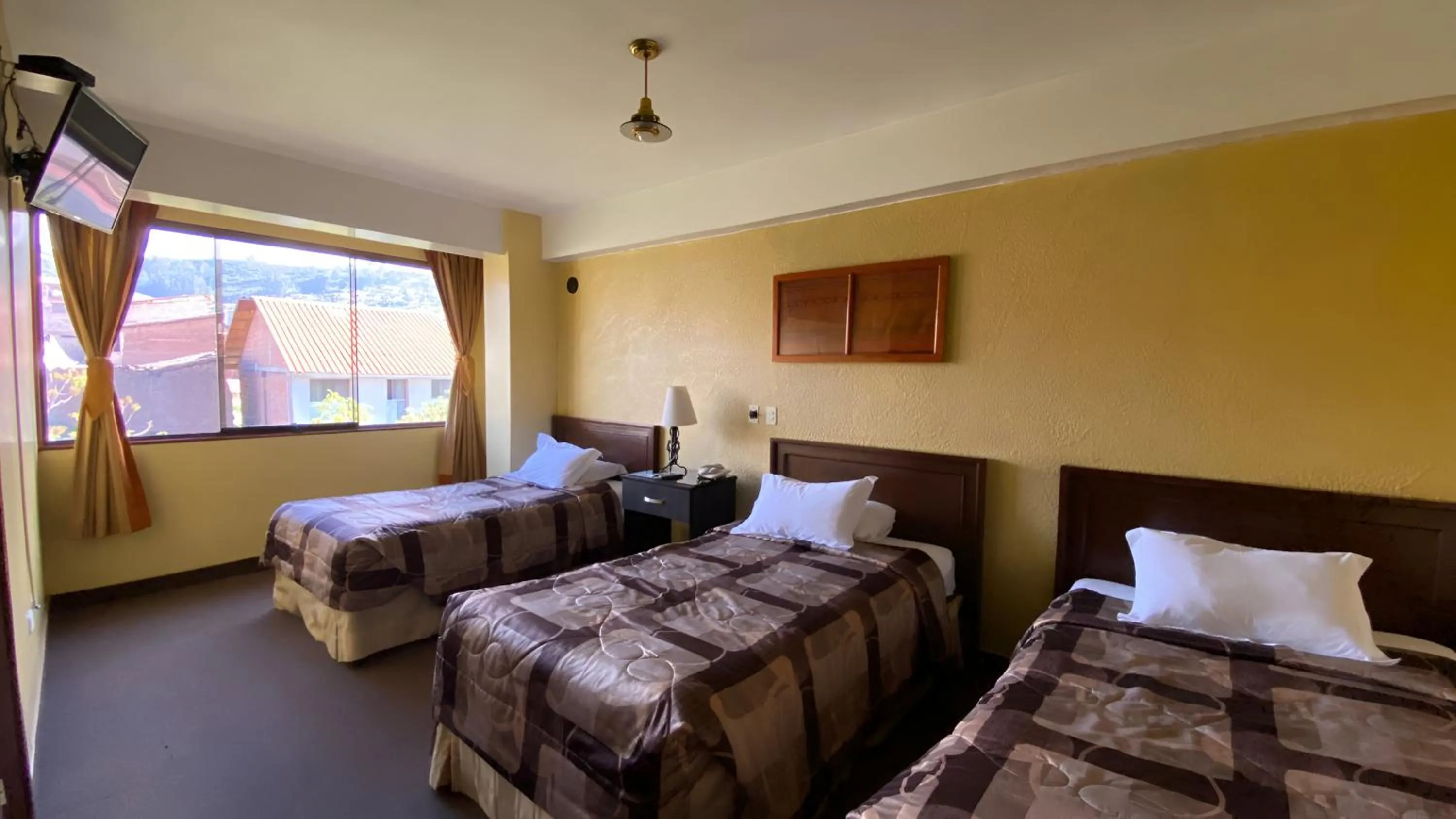 Bed in Hotel El Puma