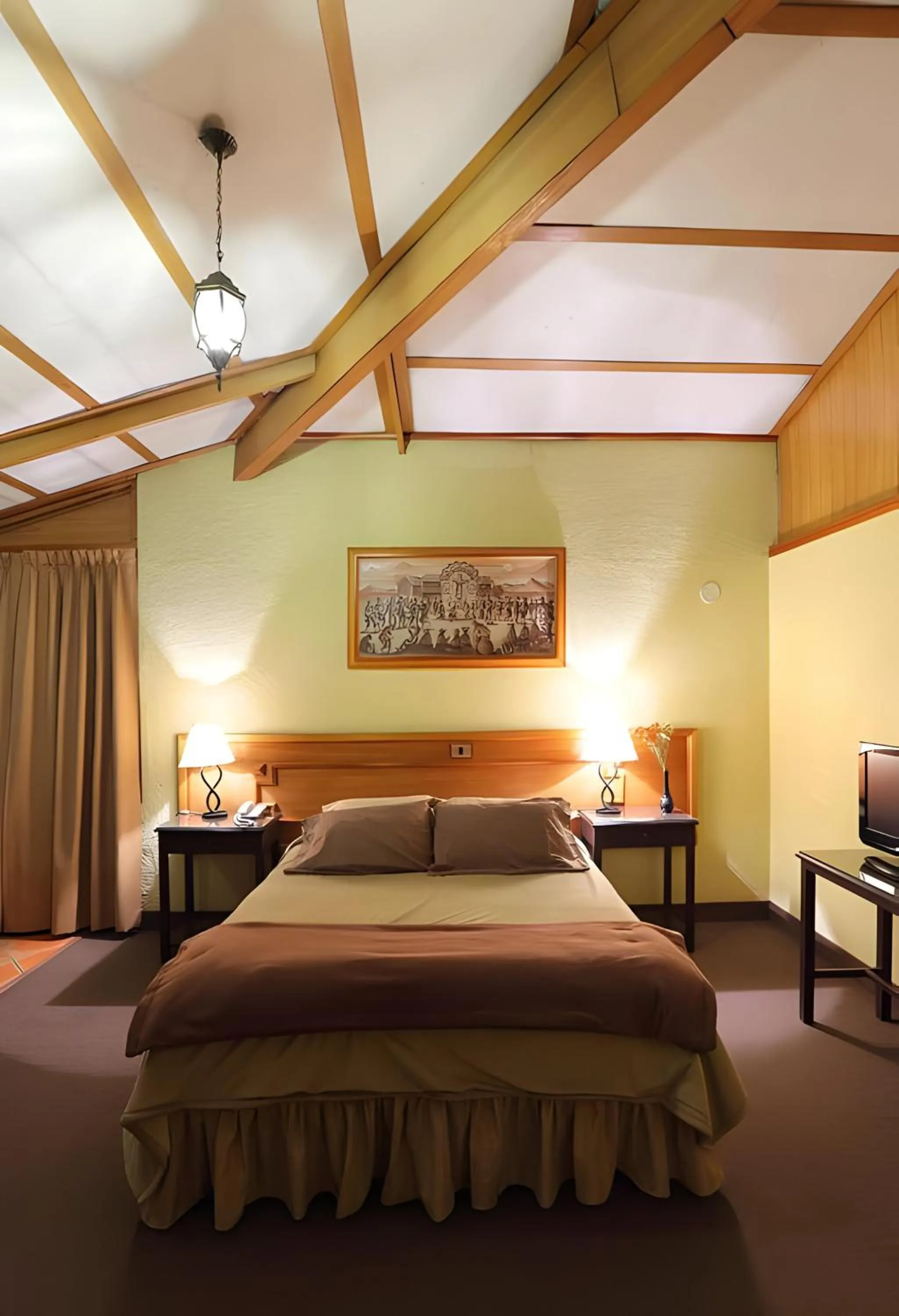 Bed in Hotel El Puma