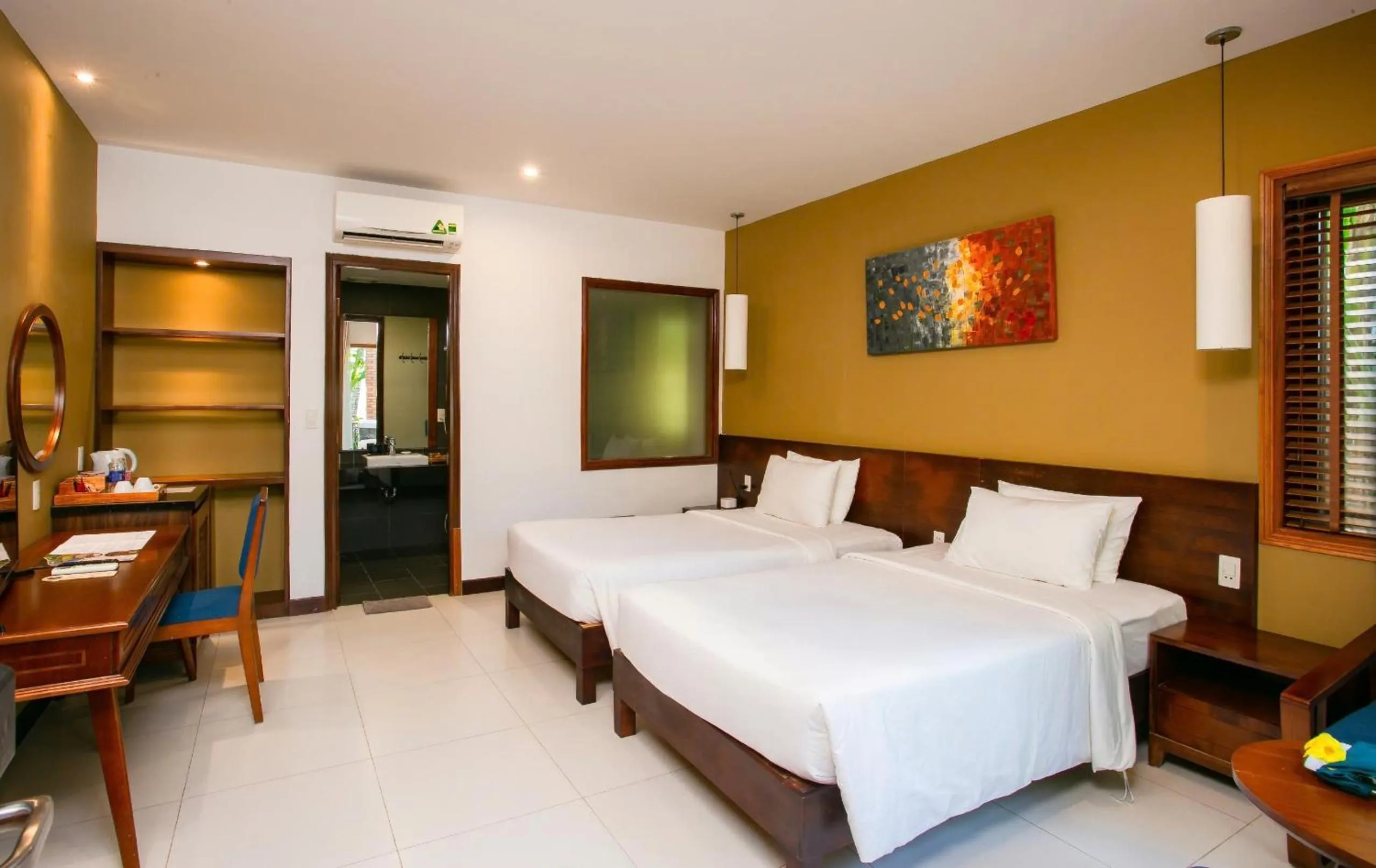 Bed in Nadine Phu Quoc Resort & Spa