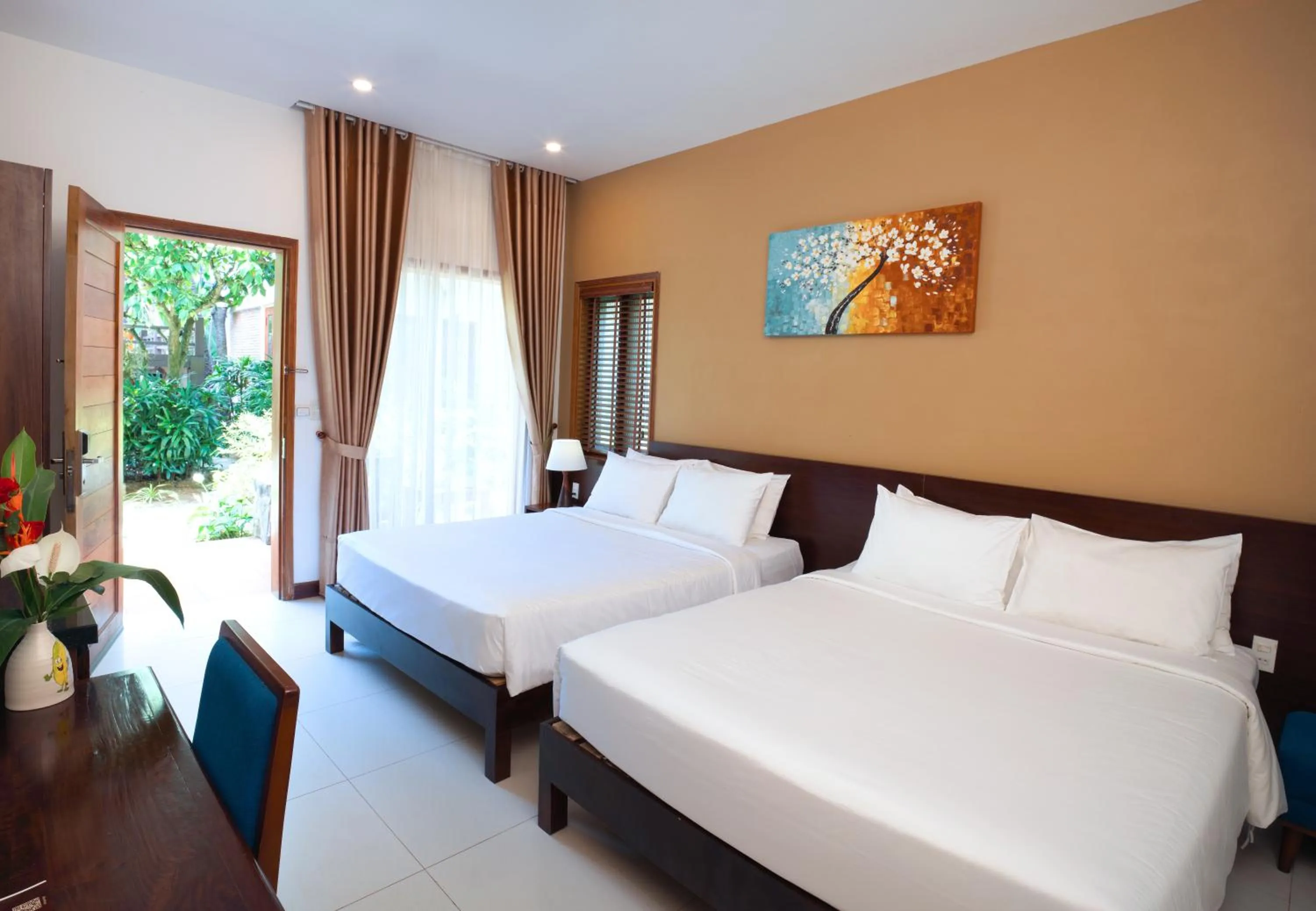 Bed in Nadine Phu Quoc Resort & Spa