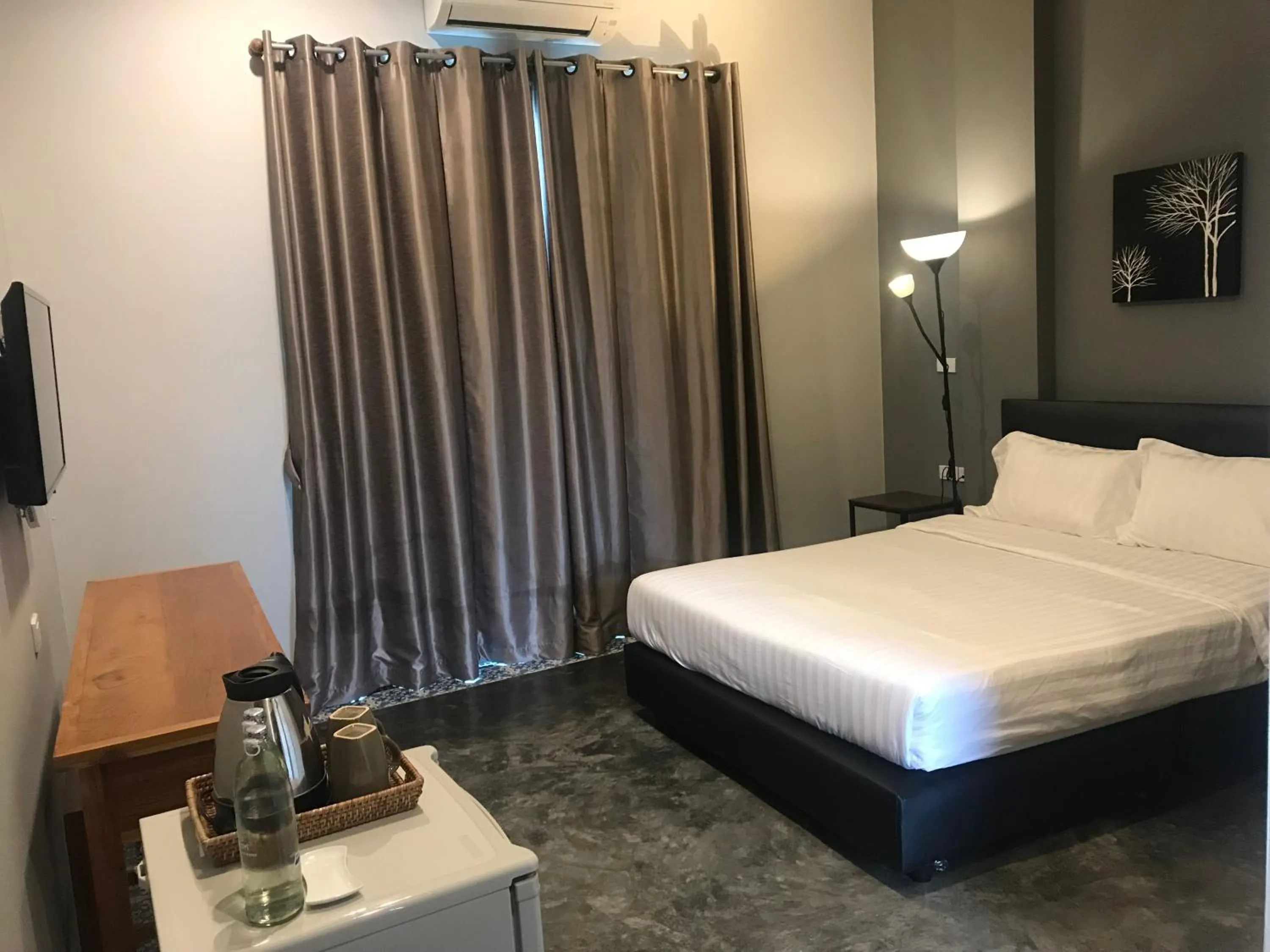 Photo of the whole room, Bed in Nornlamphun Boutique Hotel
