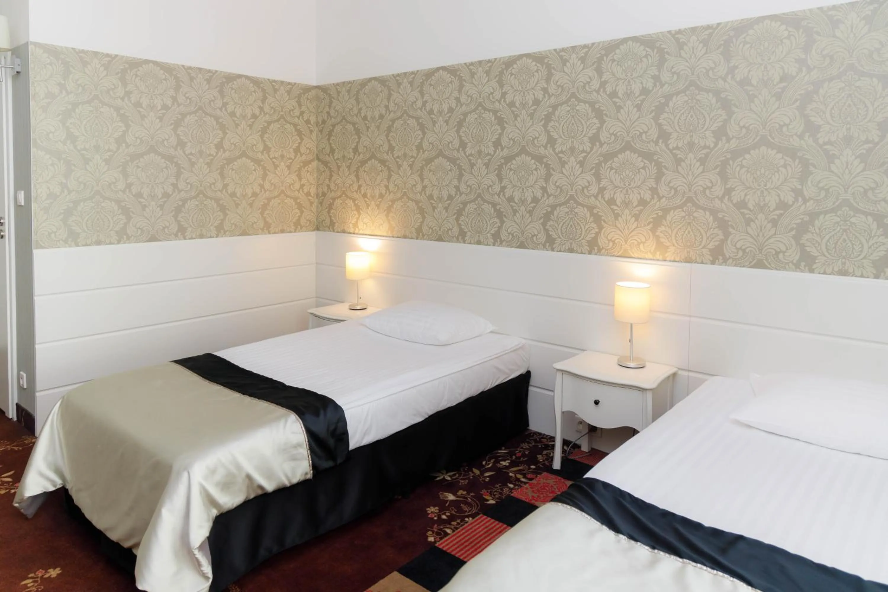 Bed in Hotel Lamberton