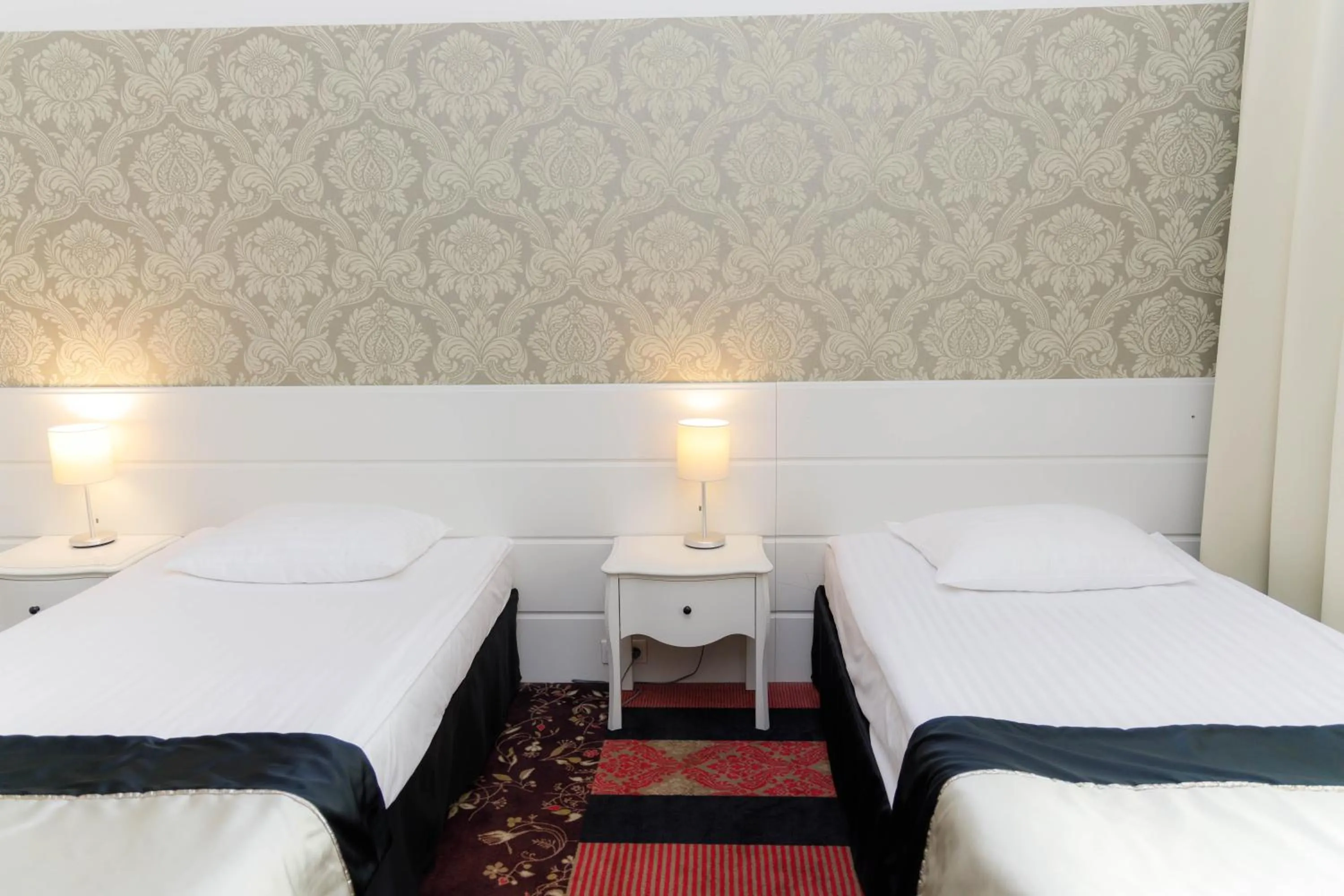 Bed in Hotel Lamberton