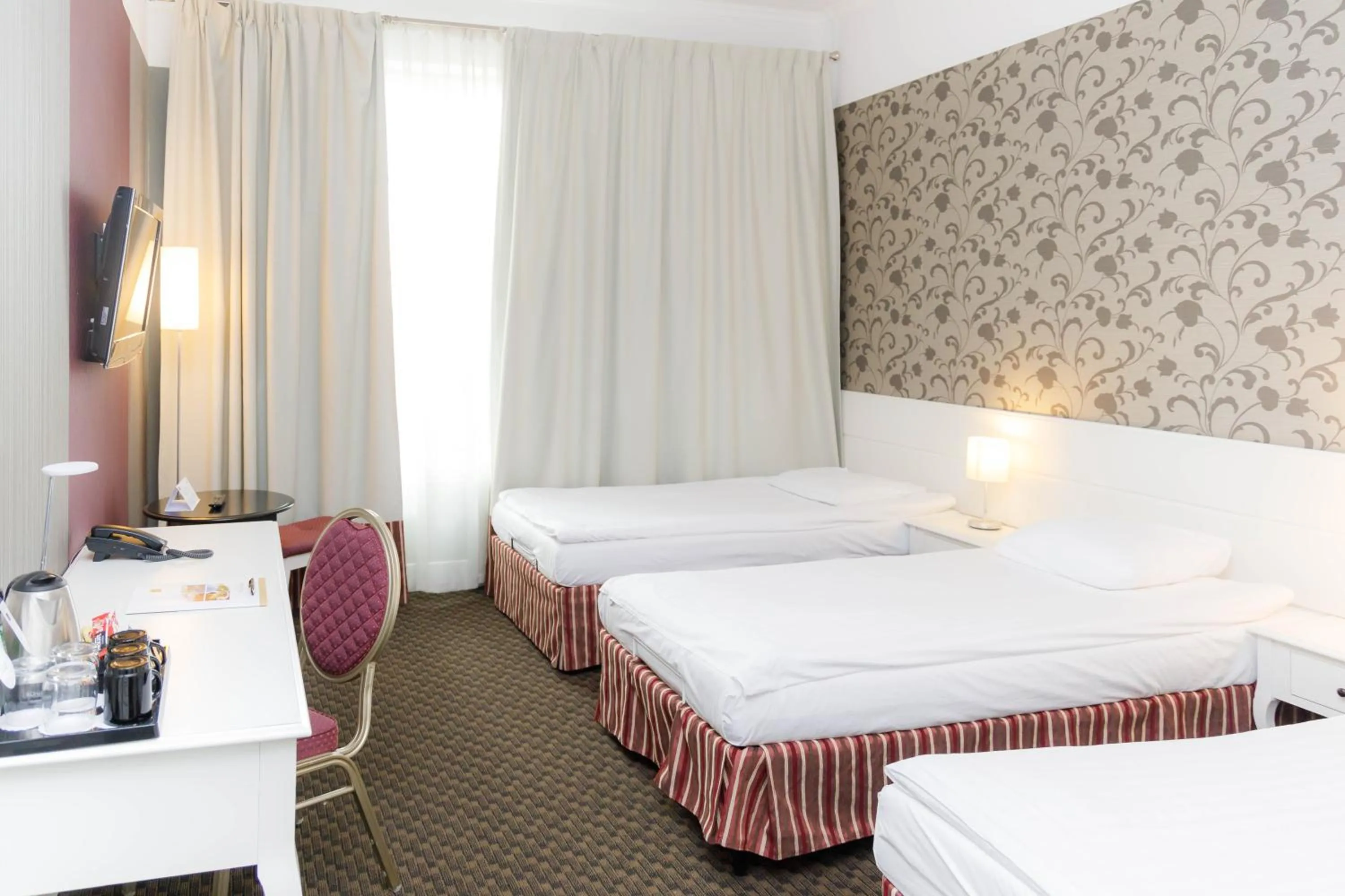 Bed in Hotel Lamberton