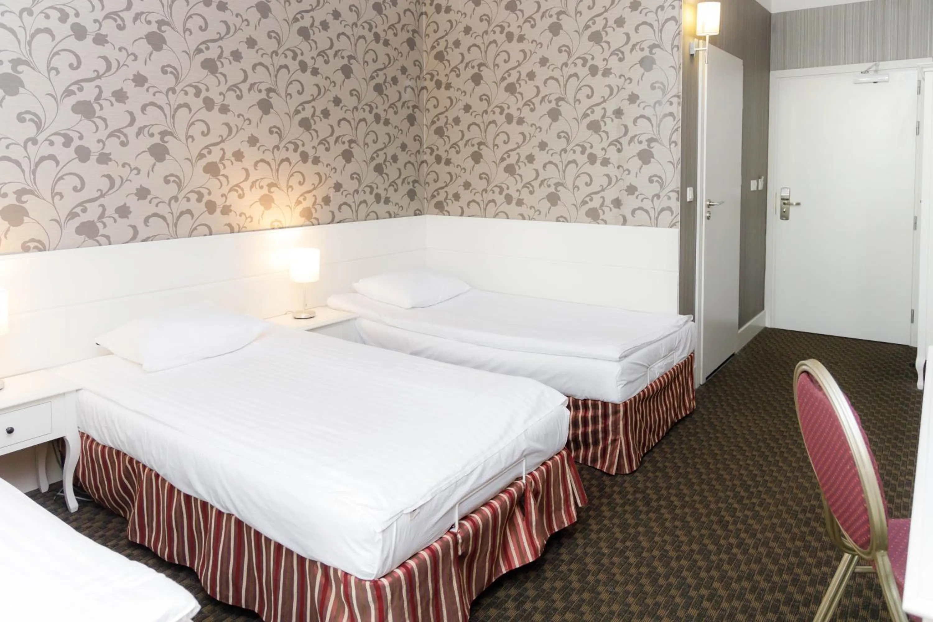 Bed in Hotel Lamberton