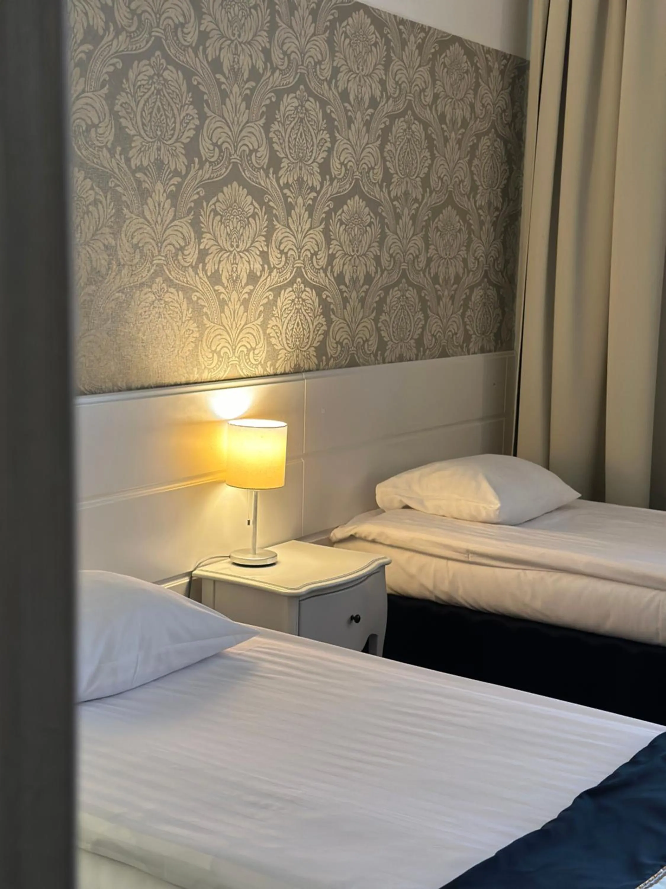 Bed in Hotel Lamberton